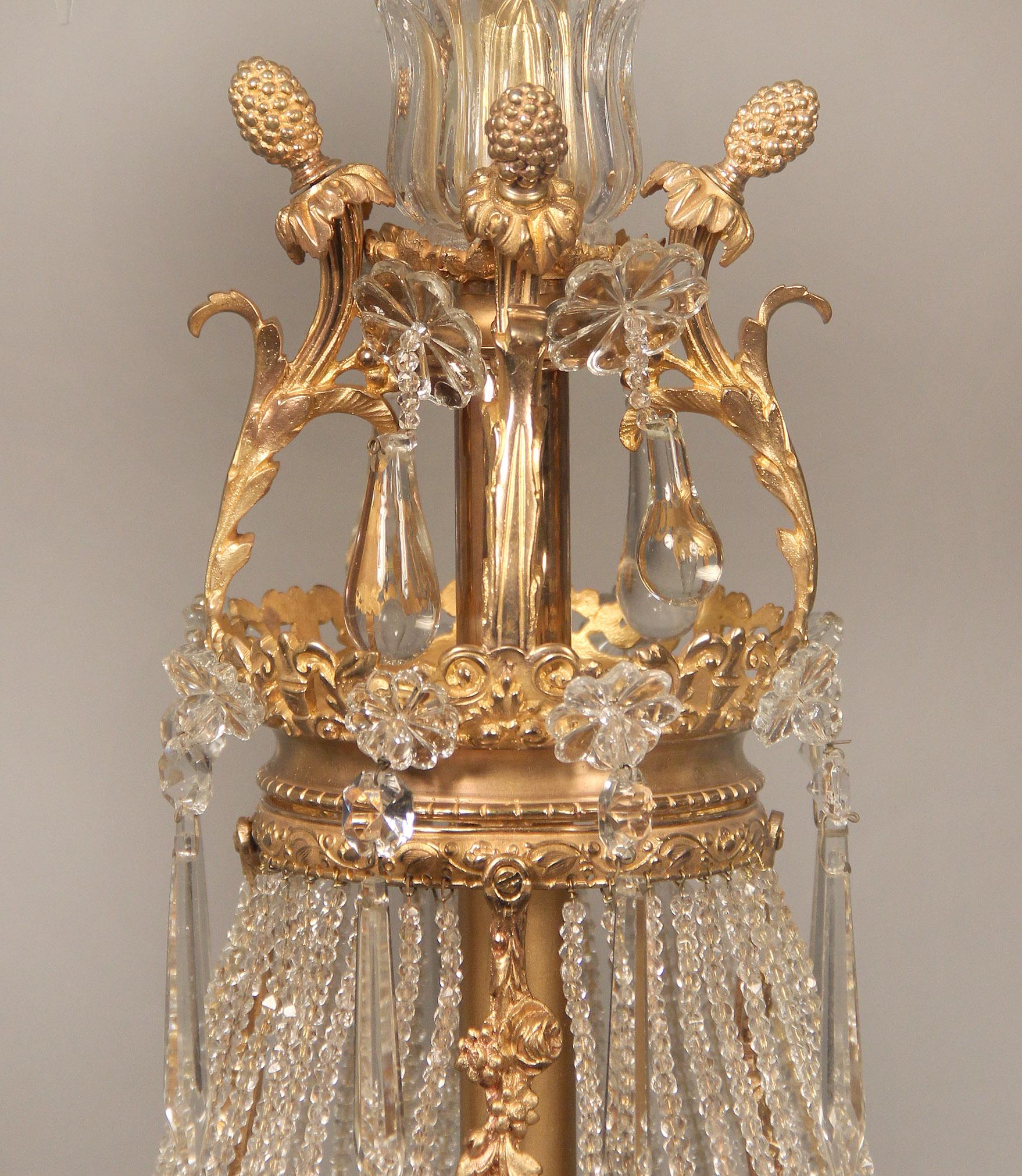 French Fine Early 20th Century Gilt Bronze and Crystal Ten-Light Basket Chandelier For Sale