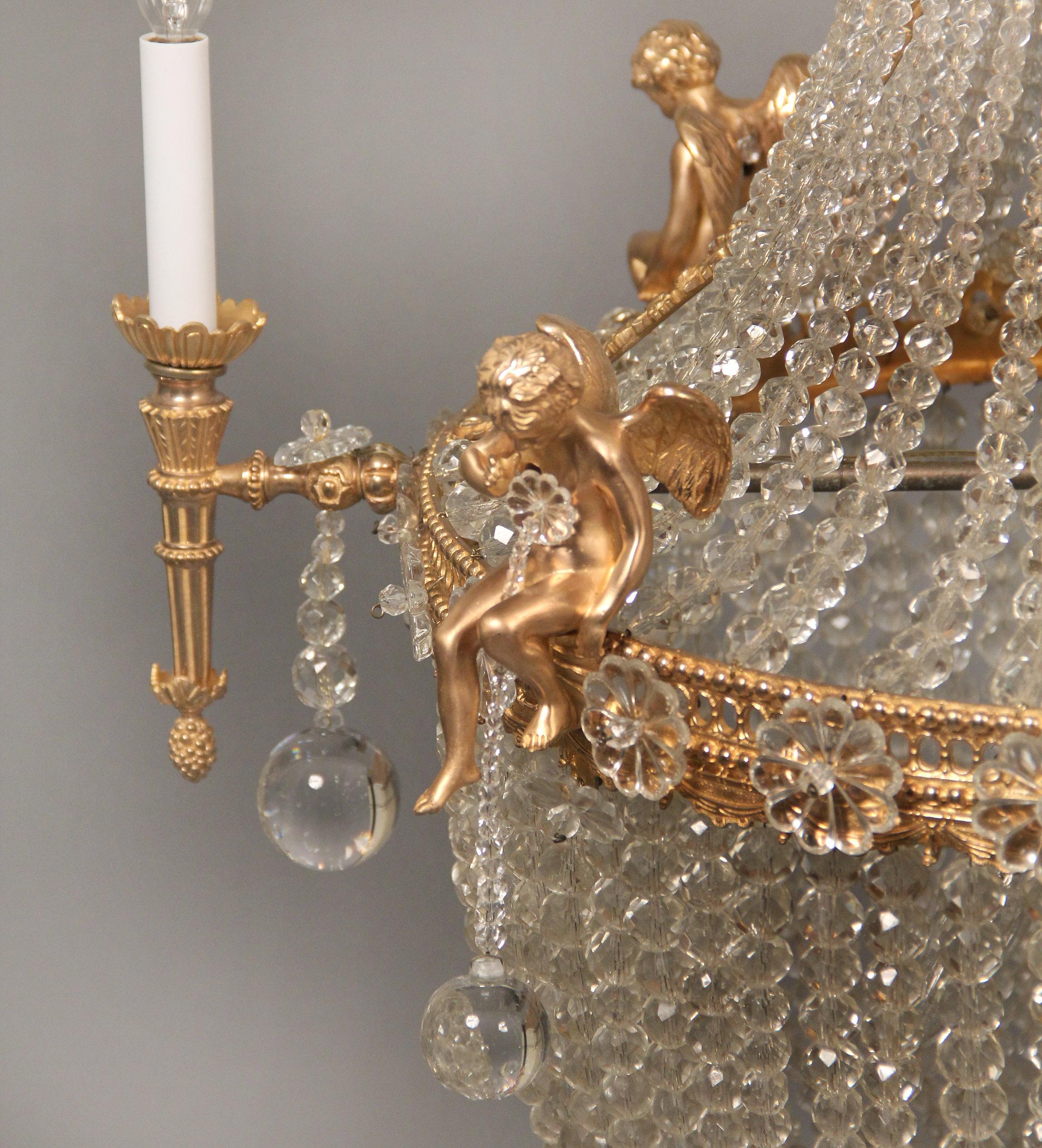 Fine Early 20th Century Gilt Bronze and Crystal Ten-Light Basket Chandelier In Good Condition For Sale In New York, NY