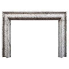 Antique A Fine Early Eighteenth Century Bolection Chimneypiece in Old English Marble