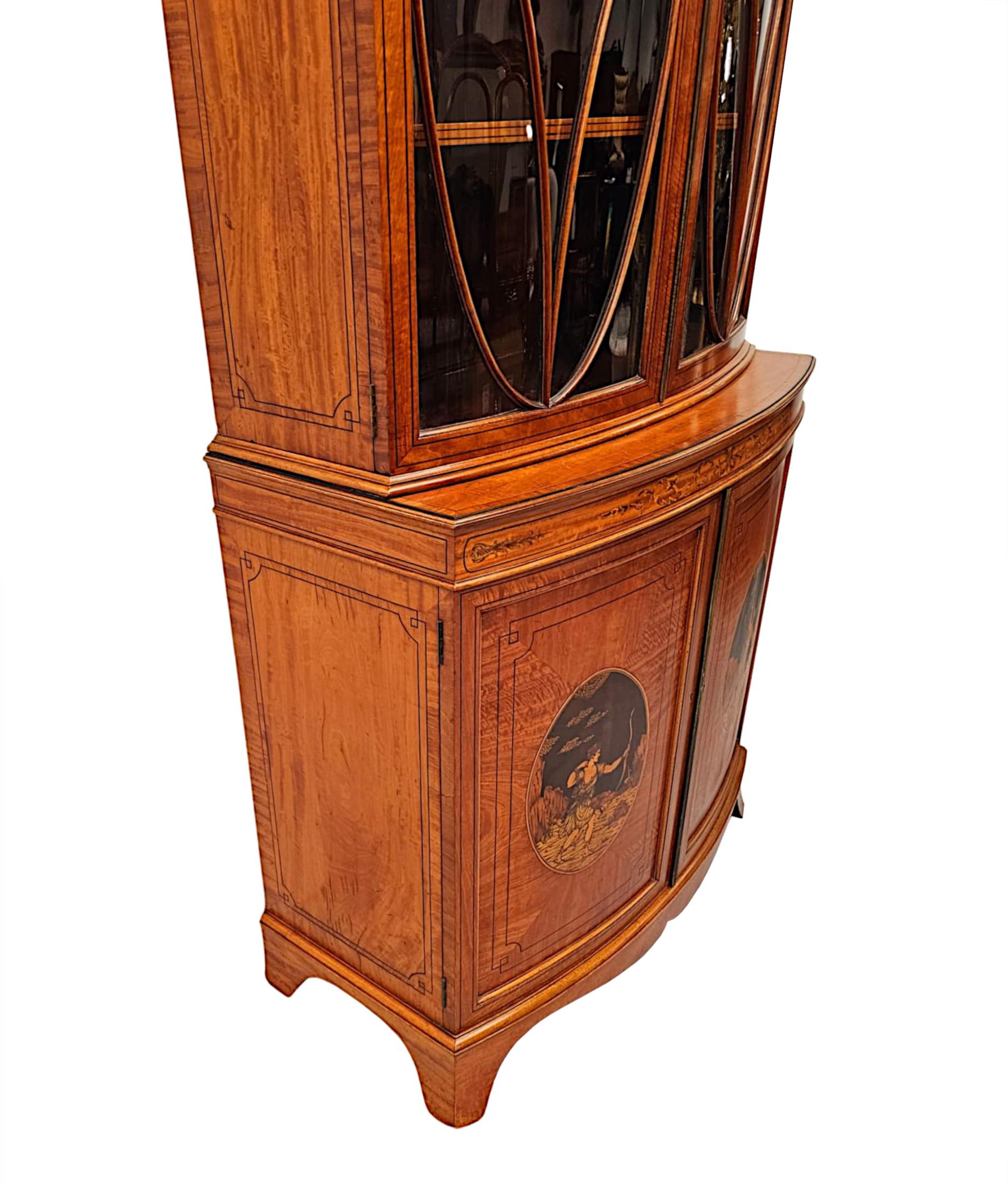 A  Fine Edwardian Marquetry Inlaid Bowfronted Bookcase afterf Edward and Roberts For Sale 5