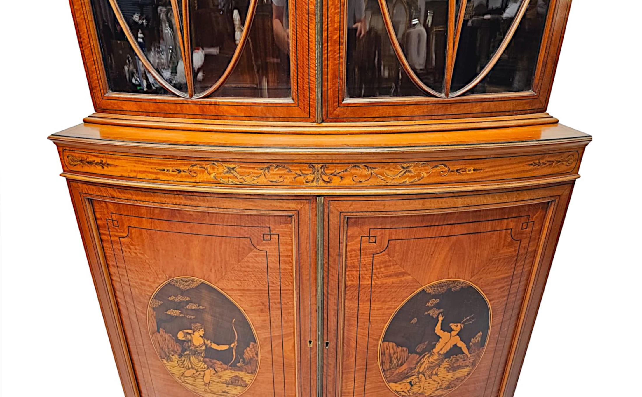 Brass A  Fine Edwardian Marquetry Inlaid Bowfronted Bookcase afterf Edward and Roberts For Sale