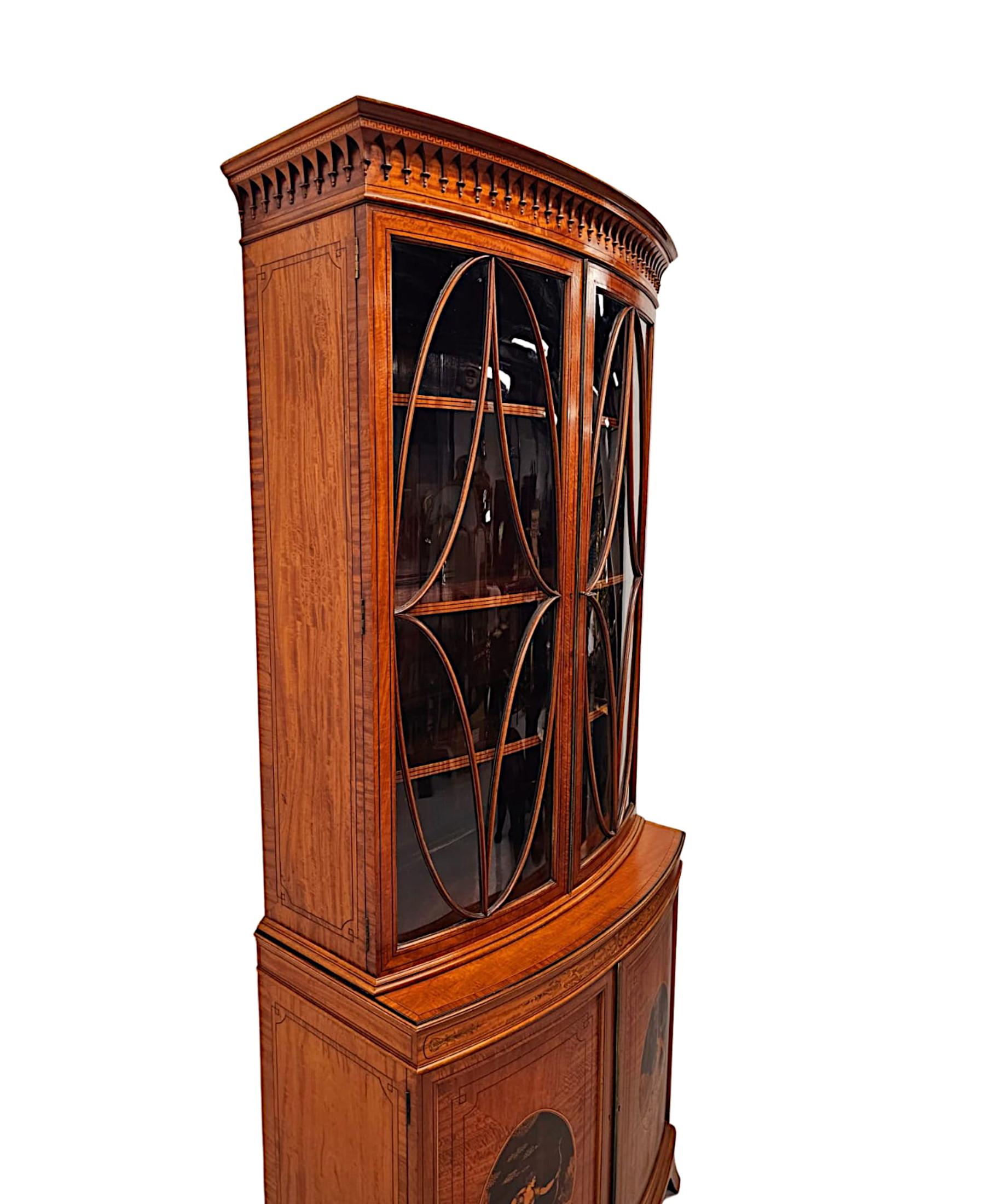 A  Fine Edwardian Marquetry Inlaid Bowfronted Bookcase afterf Edward and Roberts For Sale 1