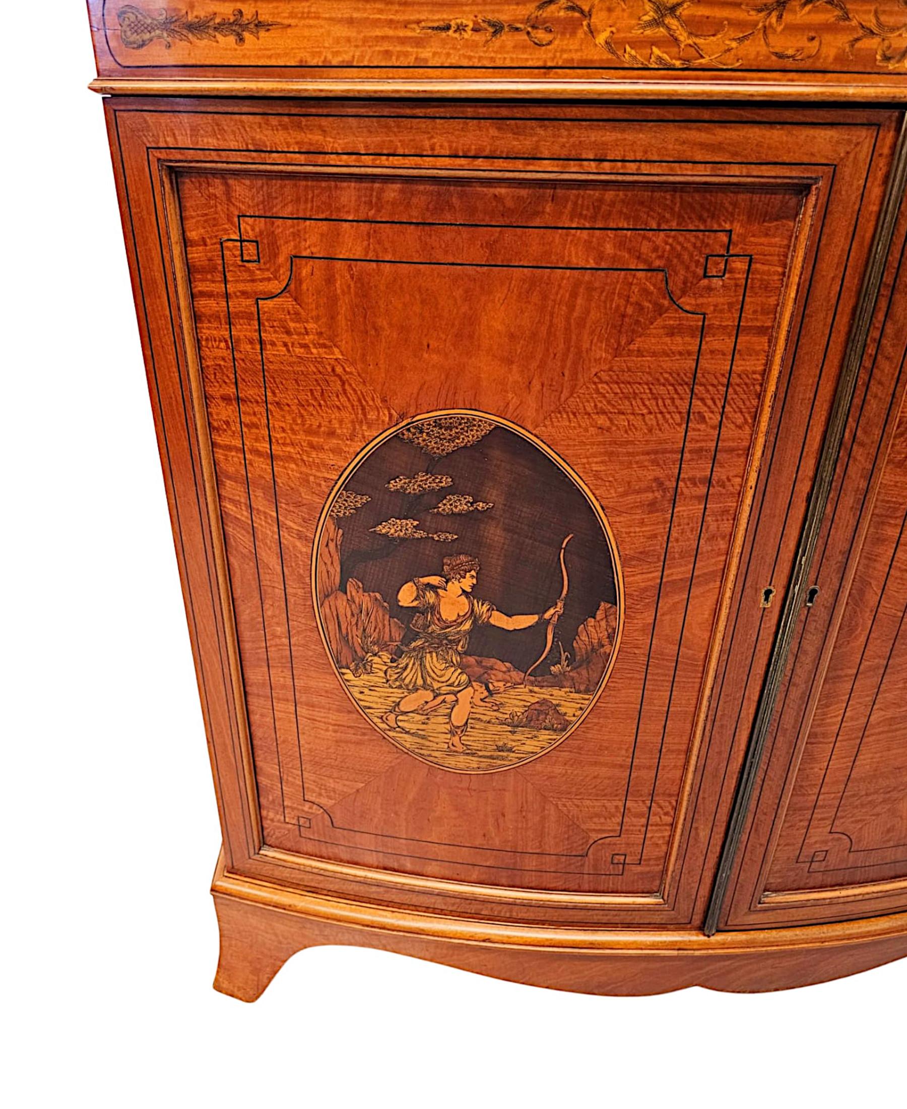 A  Fine Edwardian Marquetry Inlaid Bowfronted Bookcase afterf Edward and Roberts For Sale 3
