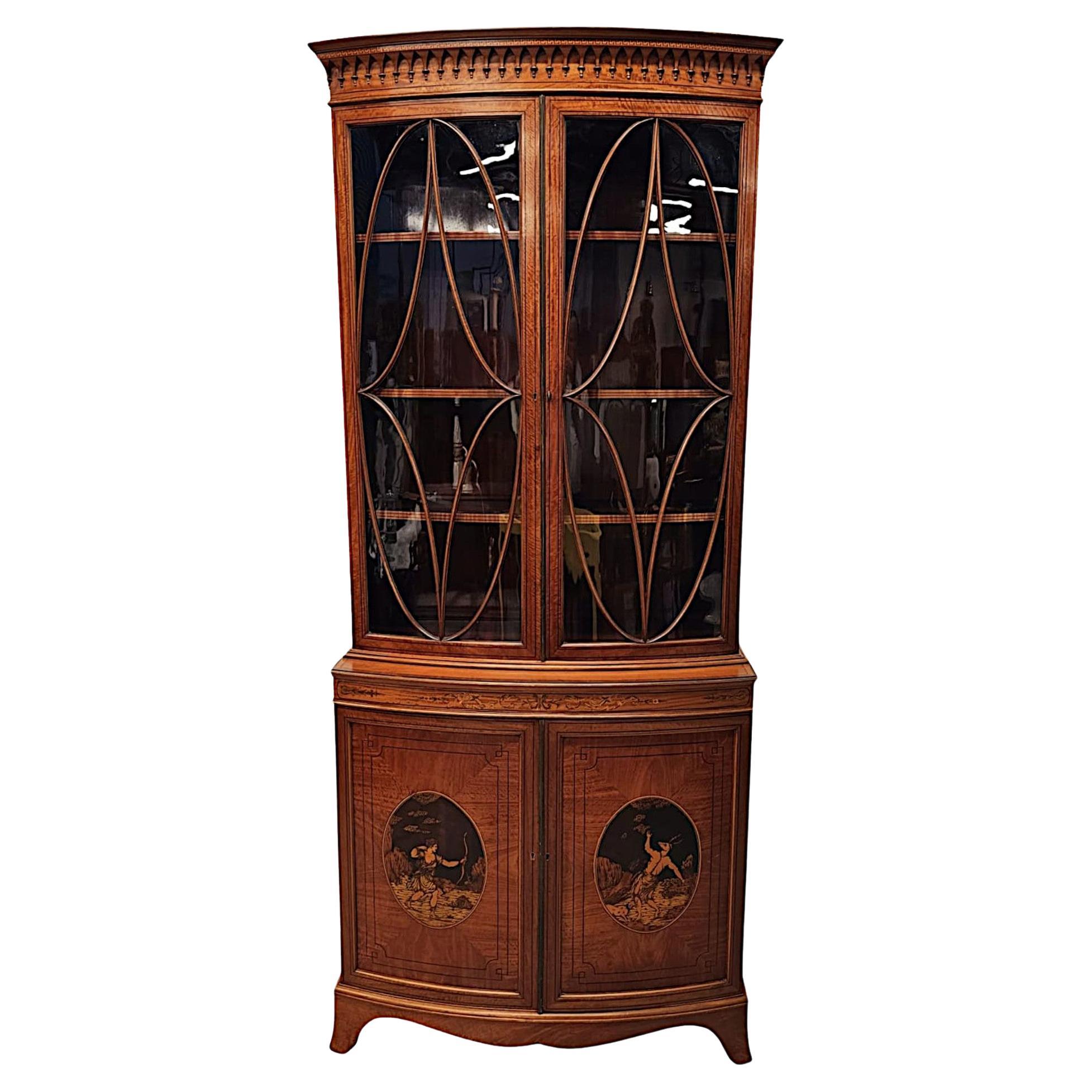 A  Fine Edwardian Marquetry Inlaid Bowfronted Bookcase afterf Edward and Roberts For Sale