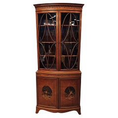 A  Fine Edwardian Marquetry Inlaid Bowfronted Bookcase afterf Edward and Roberts