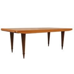 A Fine French Art Deco Expandable Dining Table with Ribbed Brass Conical Legs