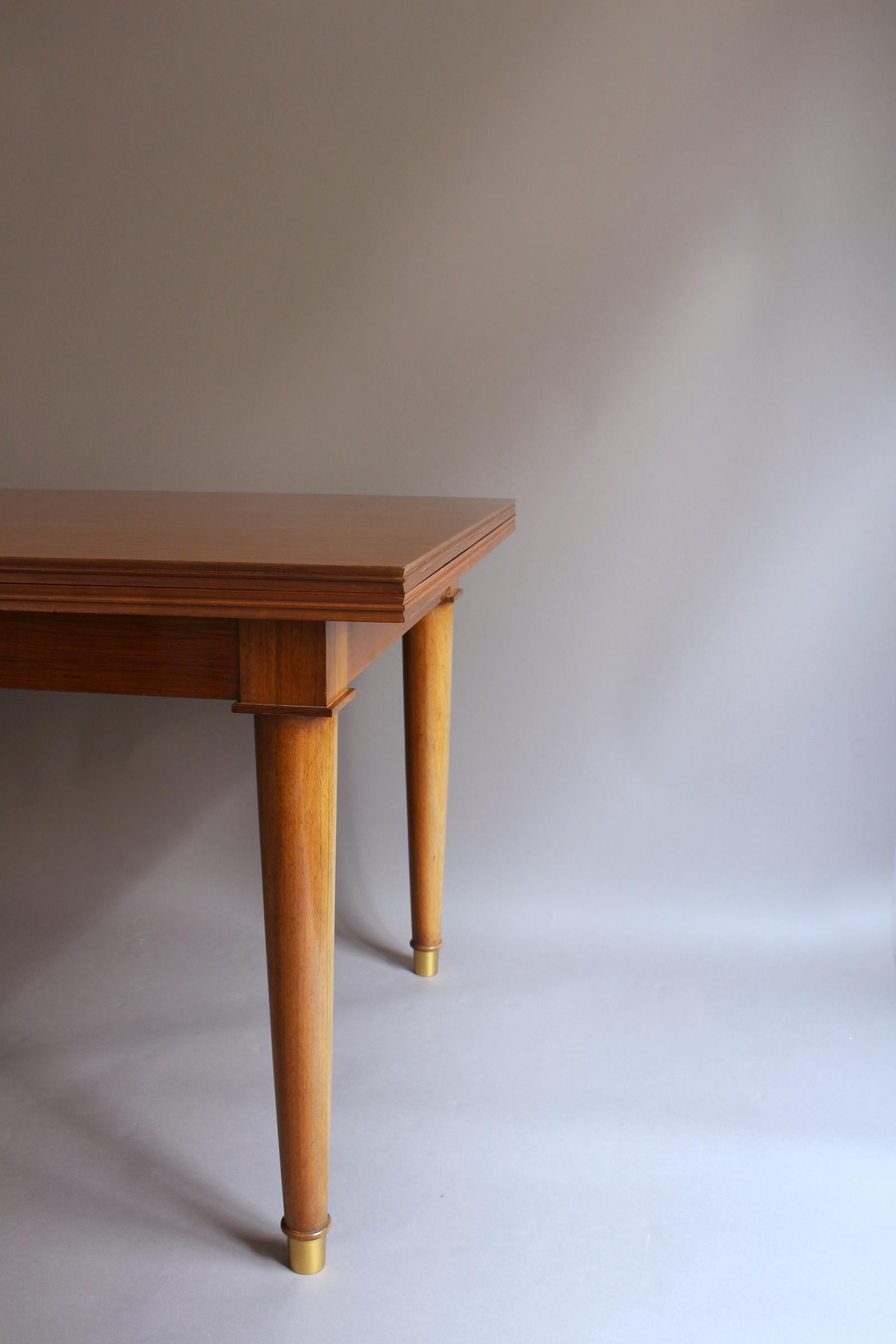 A Fine French Art Deco Walnut Extendable Dining Table by Jules Leleu 5