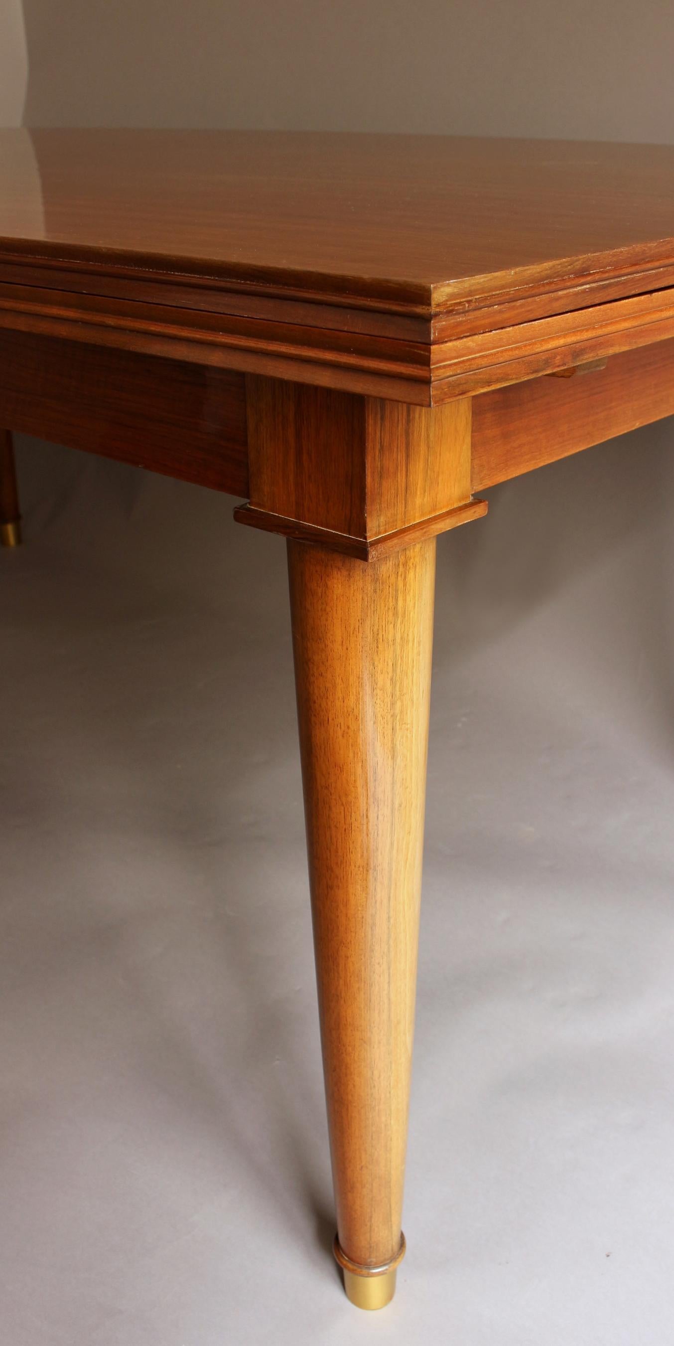 A Fine French Art Deco Walnut Extendable Dining Table by Jules Leleu 7