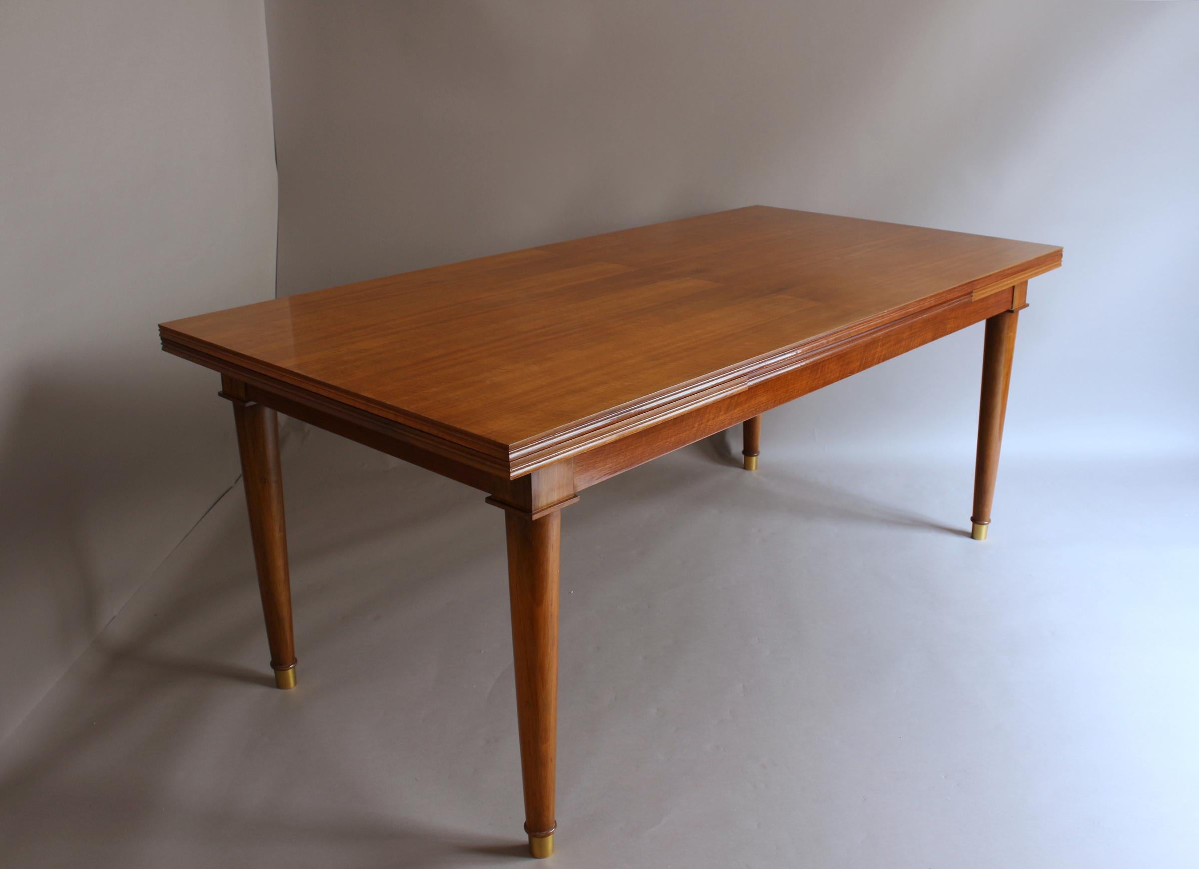 Mid-Century Modern A Fine French Art Deco Walnut Extendable Dining Table by Jules Leleu