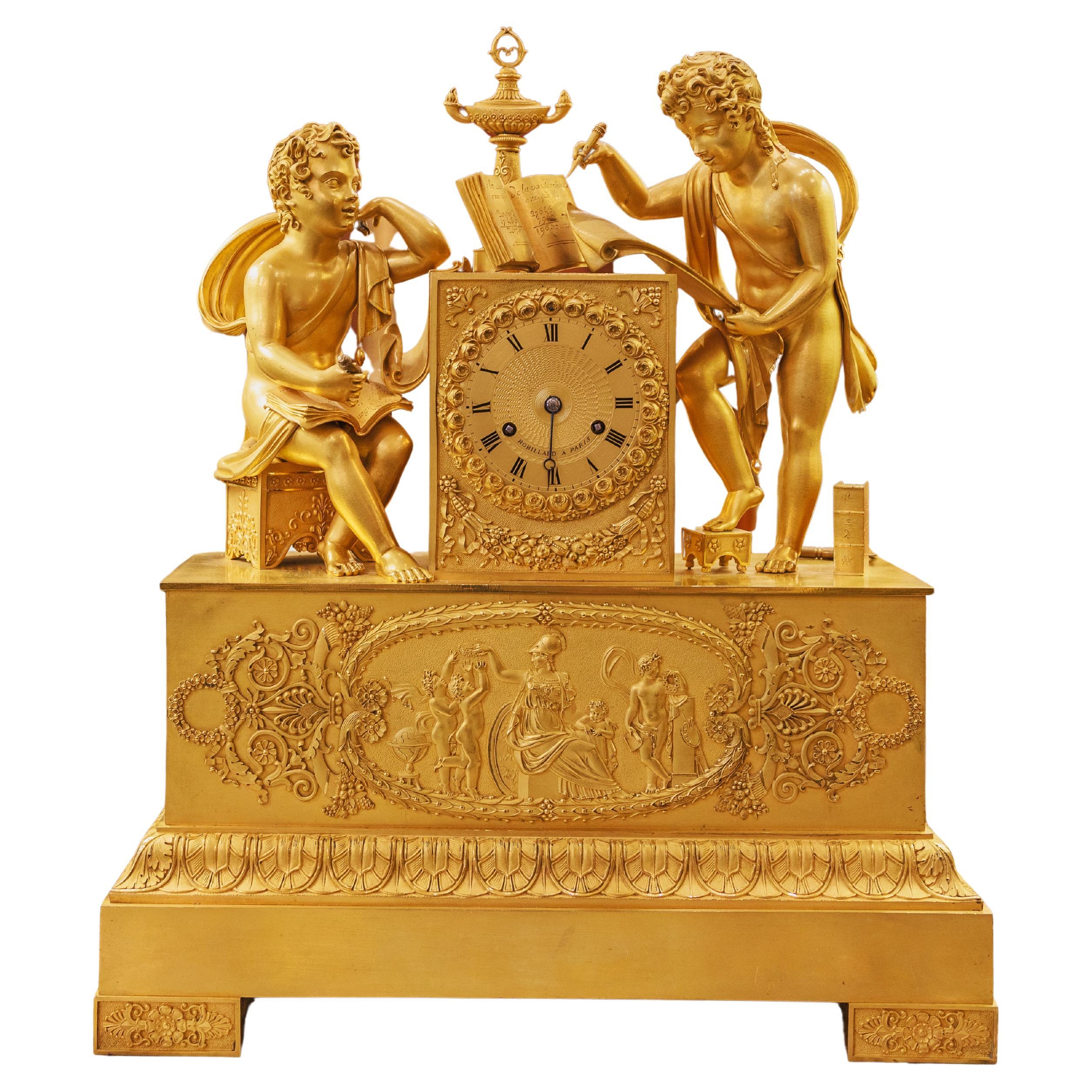 Pregevole orologio da camino francese in bronzo dorato Impero firmato A. Robillard A Paris