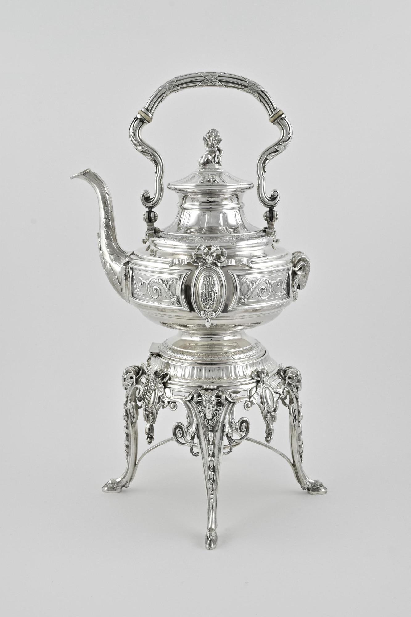 Comprising:

Kettle, Stand & Burner, (h 54cm, w 31cm d31cm)
Coffee Pot
Tea Pot
Sugar bowl & Cover
Cream Jug
Waste Bowl

silver weight 270 oz troy (8.4 kilos)
