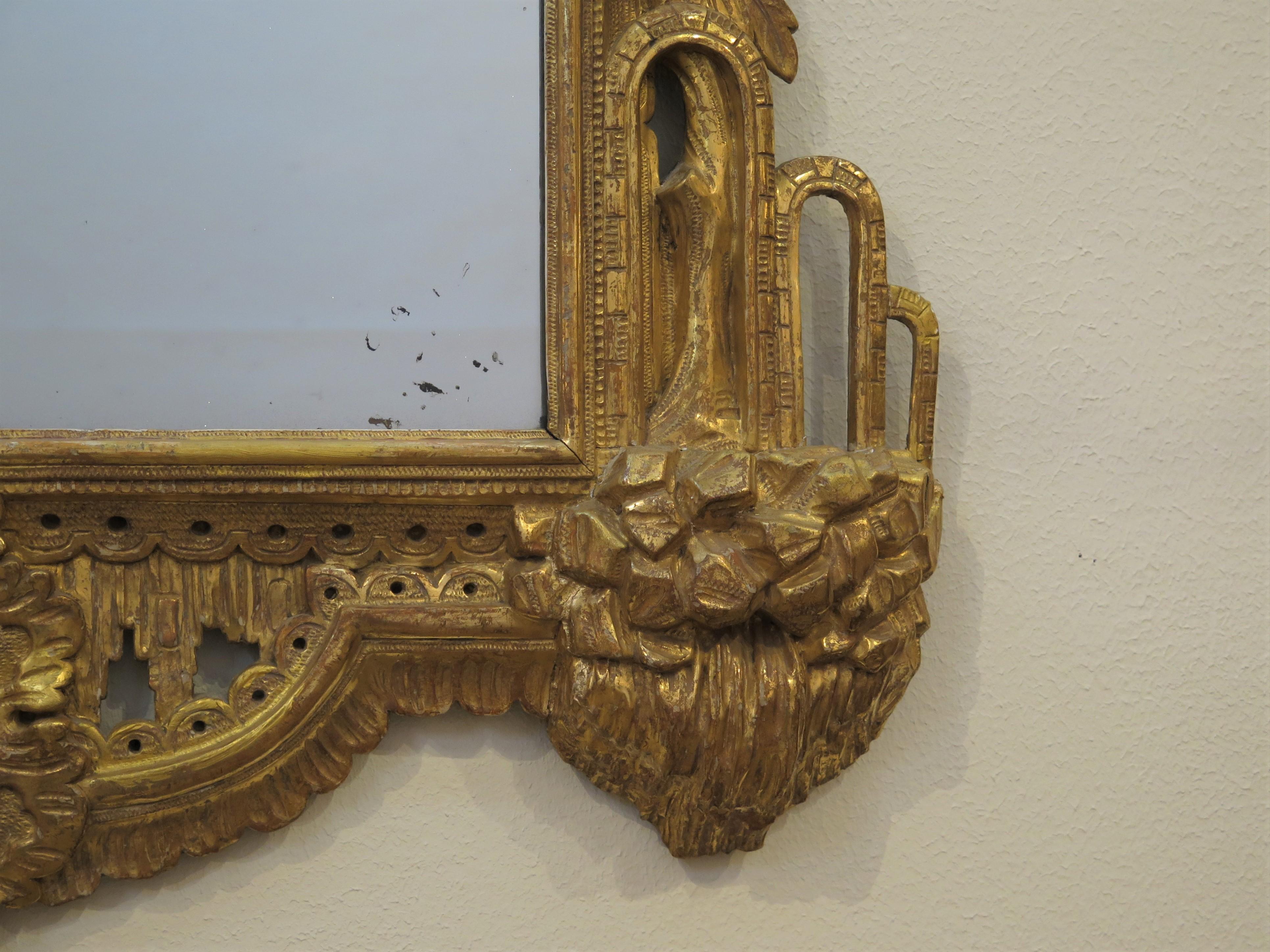 Glass A Fine George II Carved Giltwood Mirror with Phoenix Crest For Sale