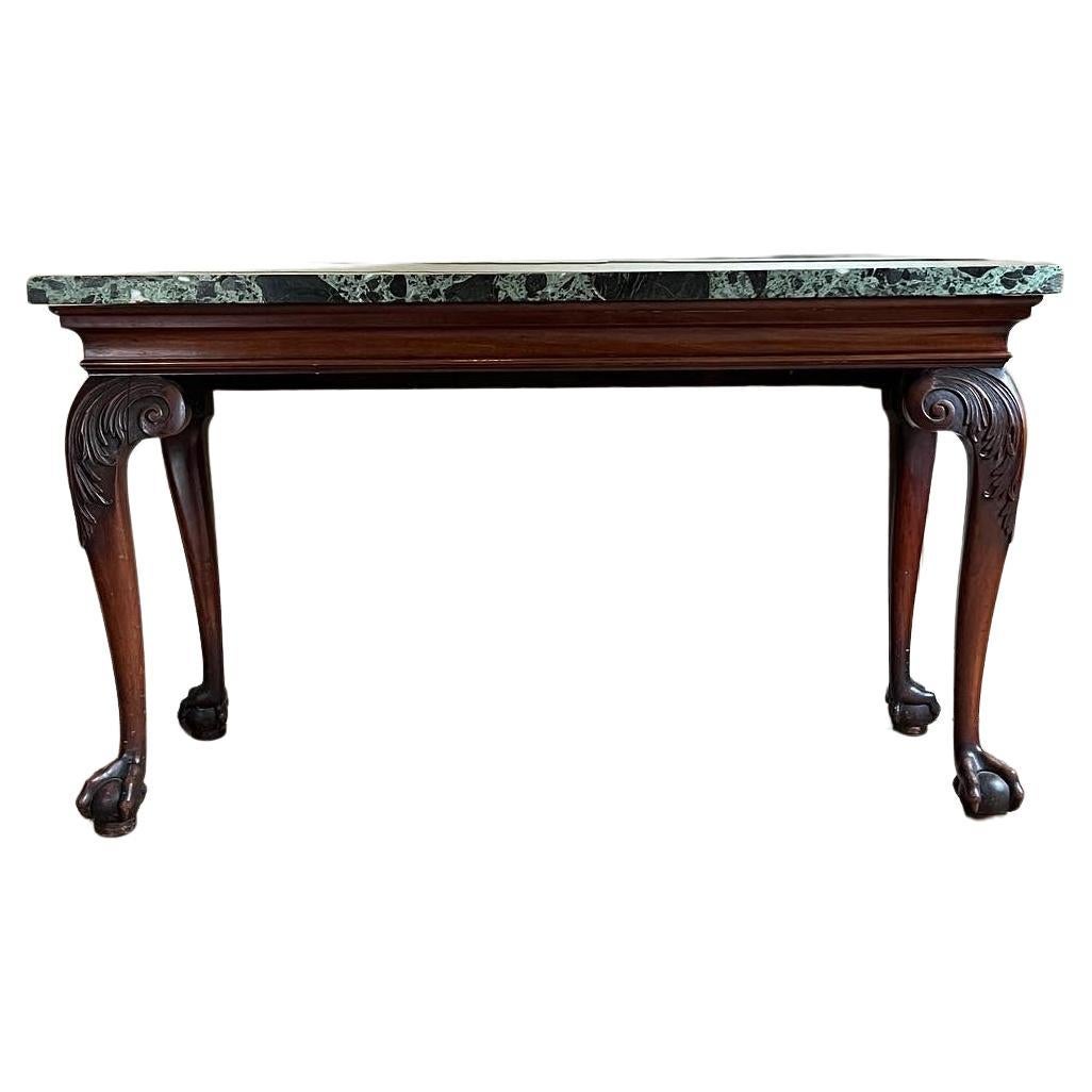 A George II giltwood marble-topped console table. For Sale at 1stDibs