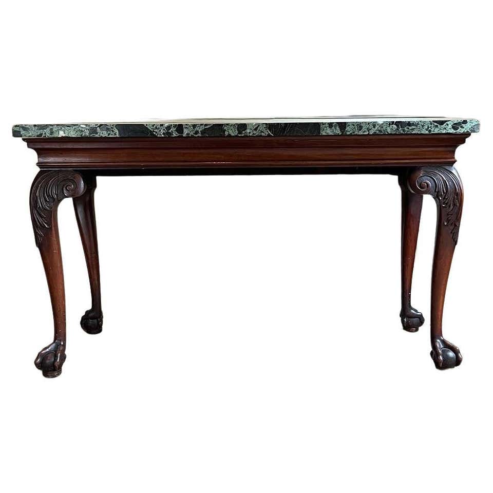 A George II giltwood marble-topped console table. For Sale at 1stDibs
