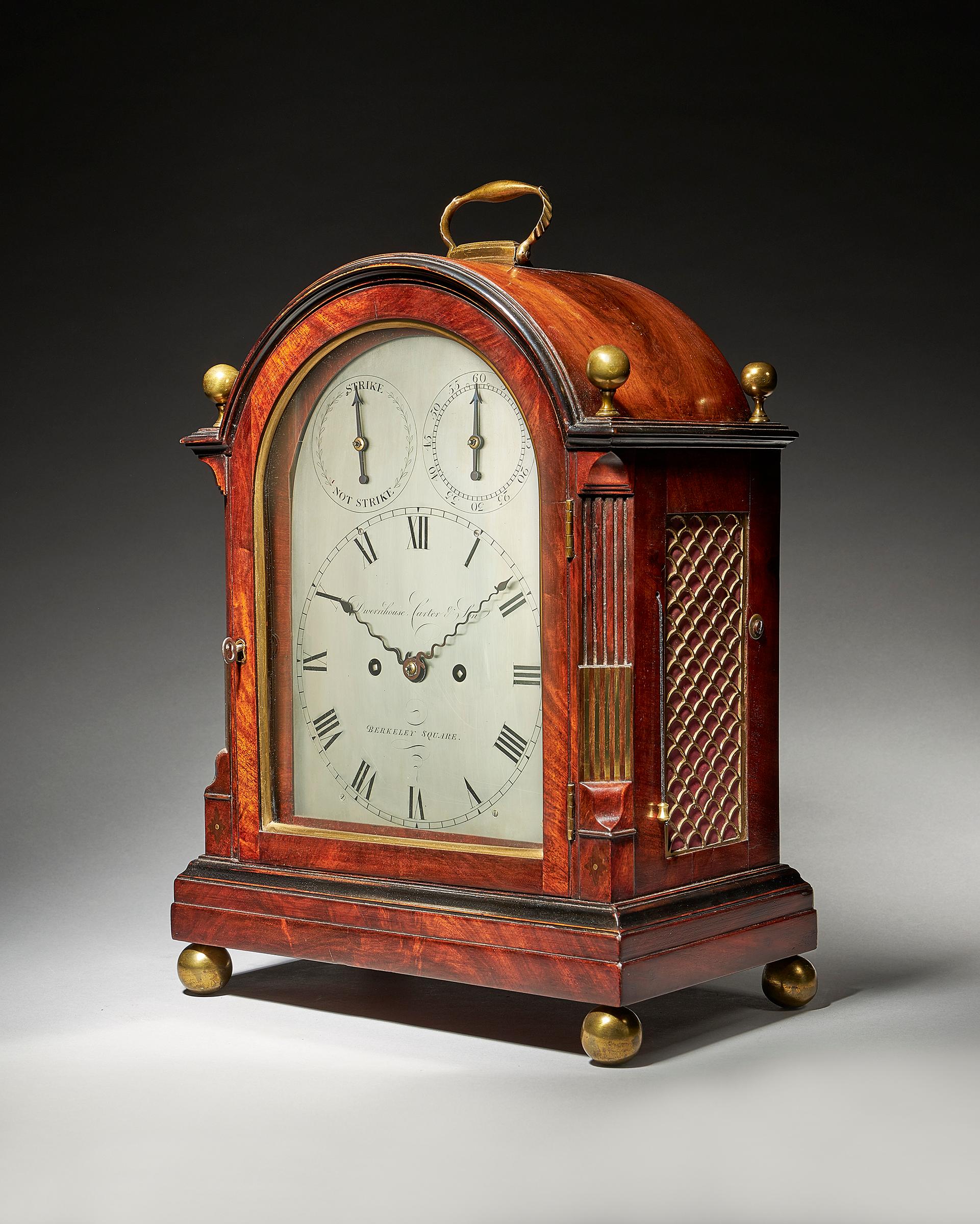 A fine George III eight-day striking mahogany bracket clock with trip repeat and silvered dial, by Dwerrihouse Carter & Son of Berkeley Square London, circa 1808-1815.
 
The eight-day twin fuse movement with trip repeat mechanism strikes on a bell