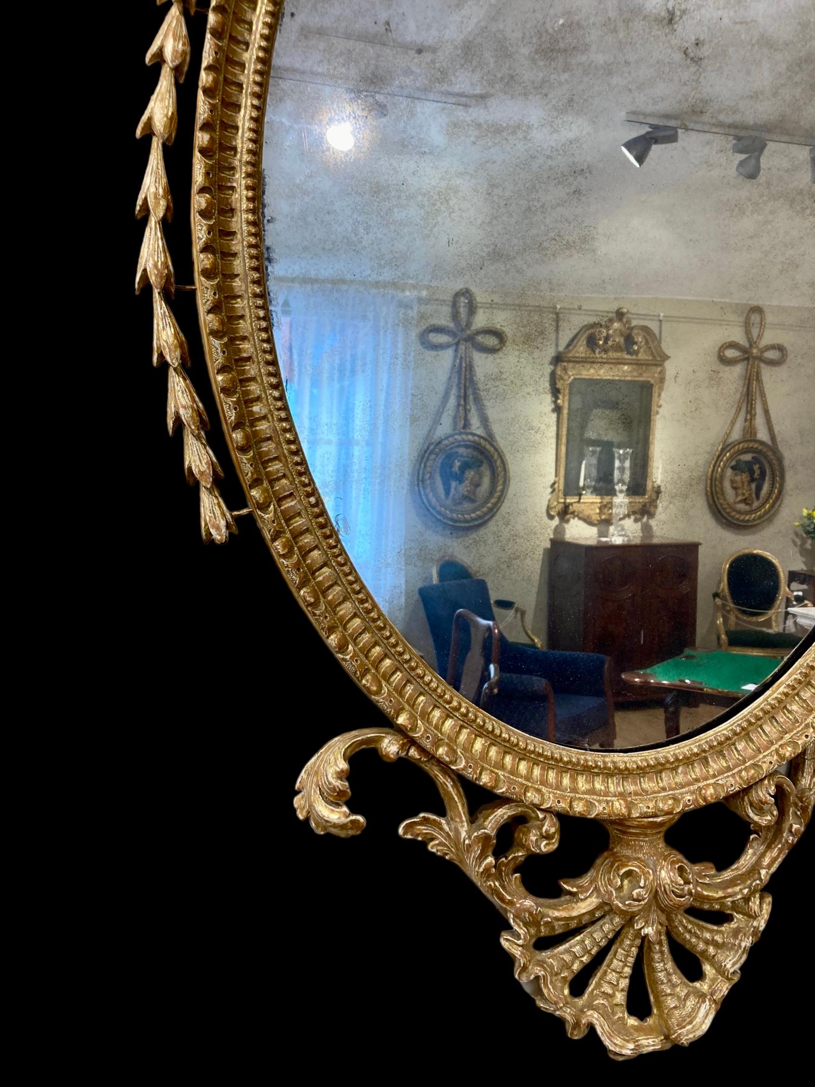 18th Century and Earlier A Fine George III period giltwood oval mirror attributed to John Linnell For Sale