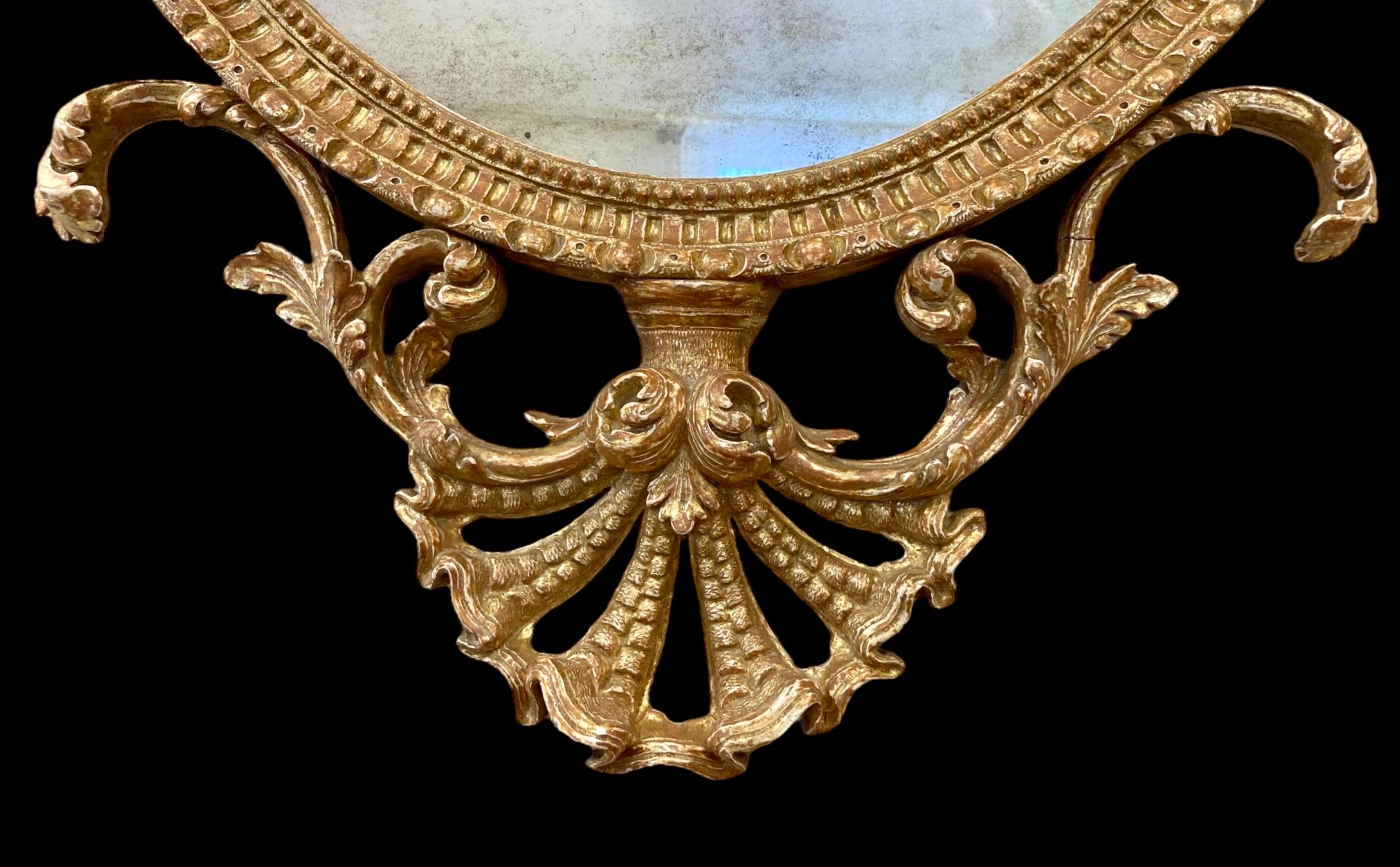 Giltwood A Fine George III period giltwood oval mirror attributed to John Linnell For Sale