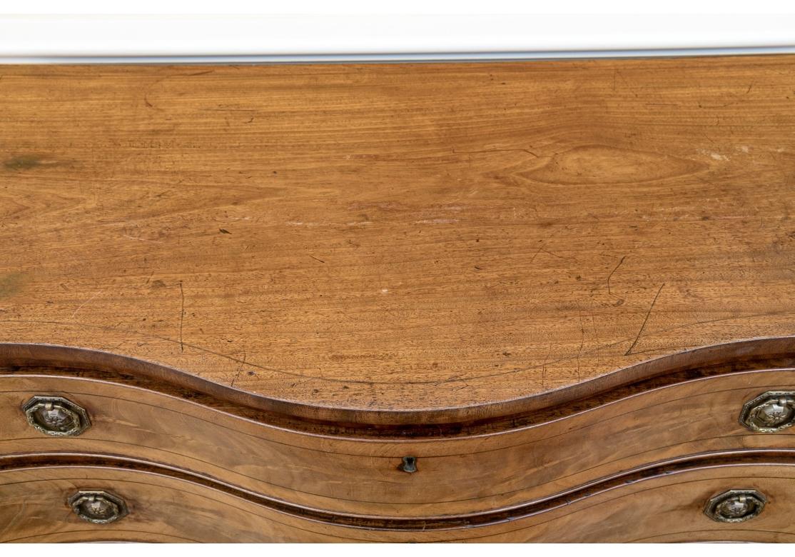 A Fine George III Serpentine Chest For Sale 7
