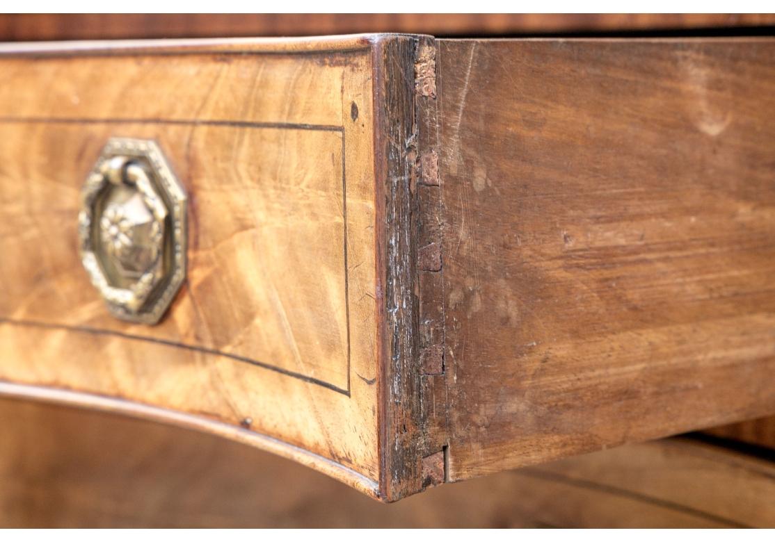 A Fine George III Serpentine Chest For Sale 8