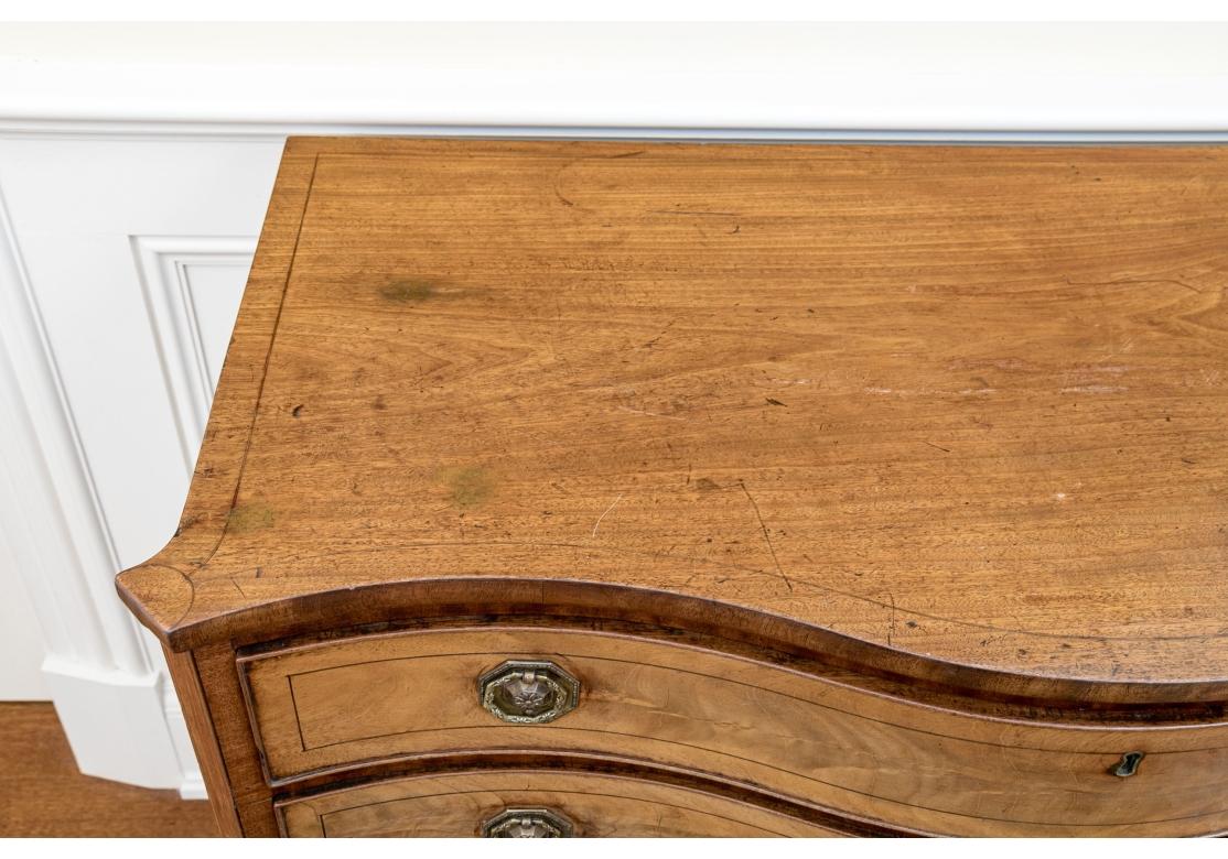 A Fine George III Serpentine Chest For Sale 2