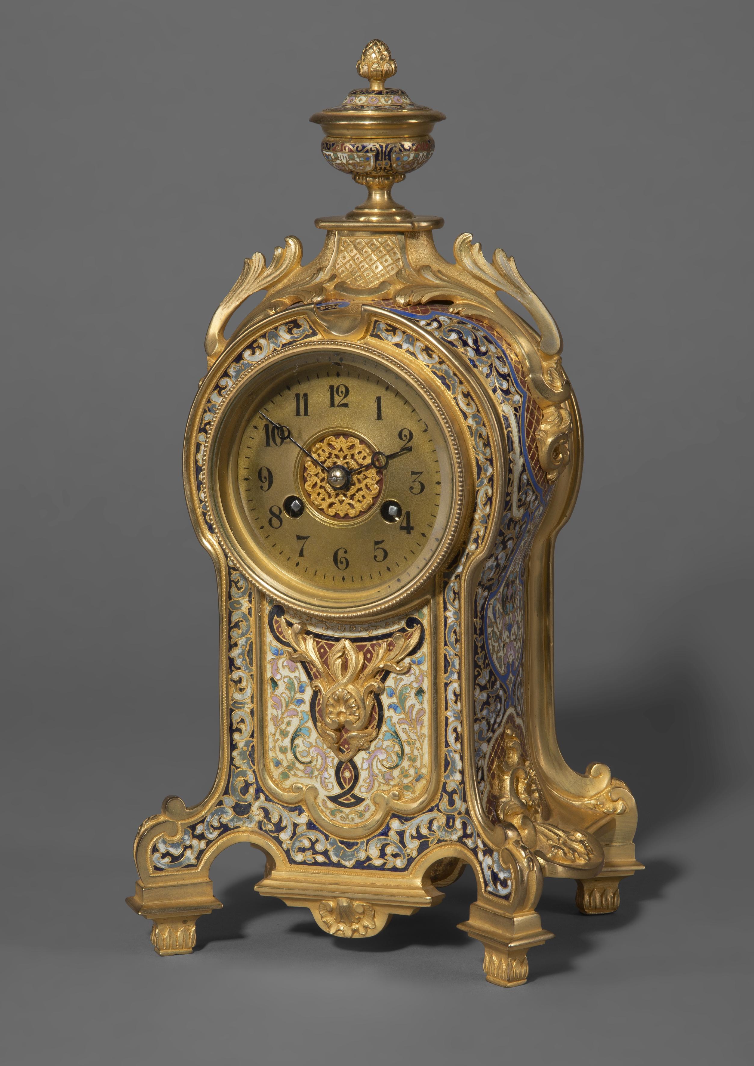 A fine gilt bronze and champlevé enamel clock.

French, circa 1880.

The movement with impressed stamp to the backplate 'Vincenti et Cie 'Médaille D'Argent 1855', 'PARIS'.

This fine clock has a gilt bronze case decorated all-over with