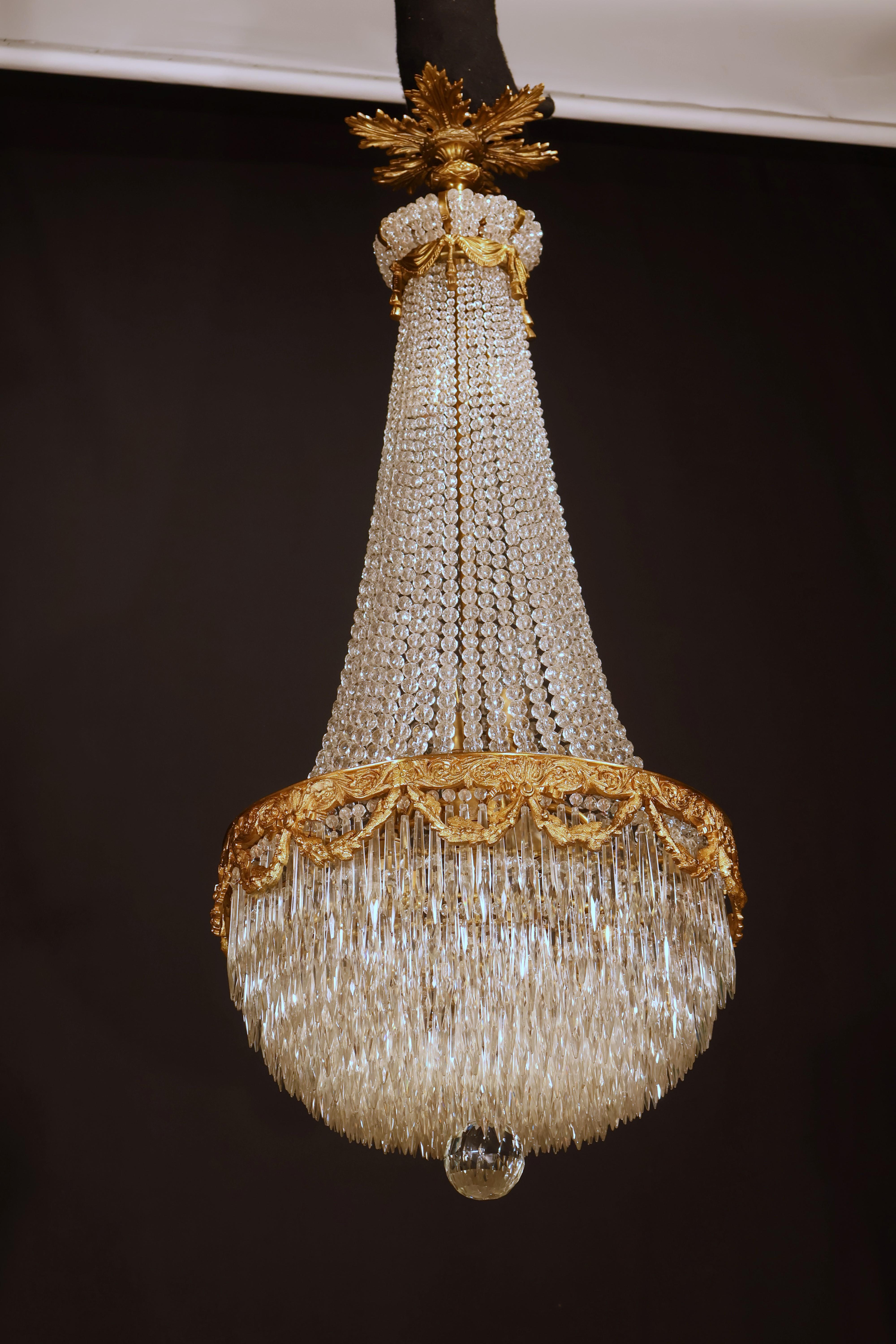 A Fine Gilt Bronze & Crystal Chandelier by Baccarat In Good Condition In Atlanta, GA