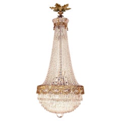 A Fine Gilt Bronze & Crystal Chandelier by Baccarat