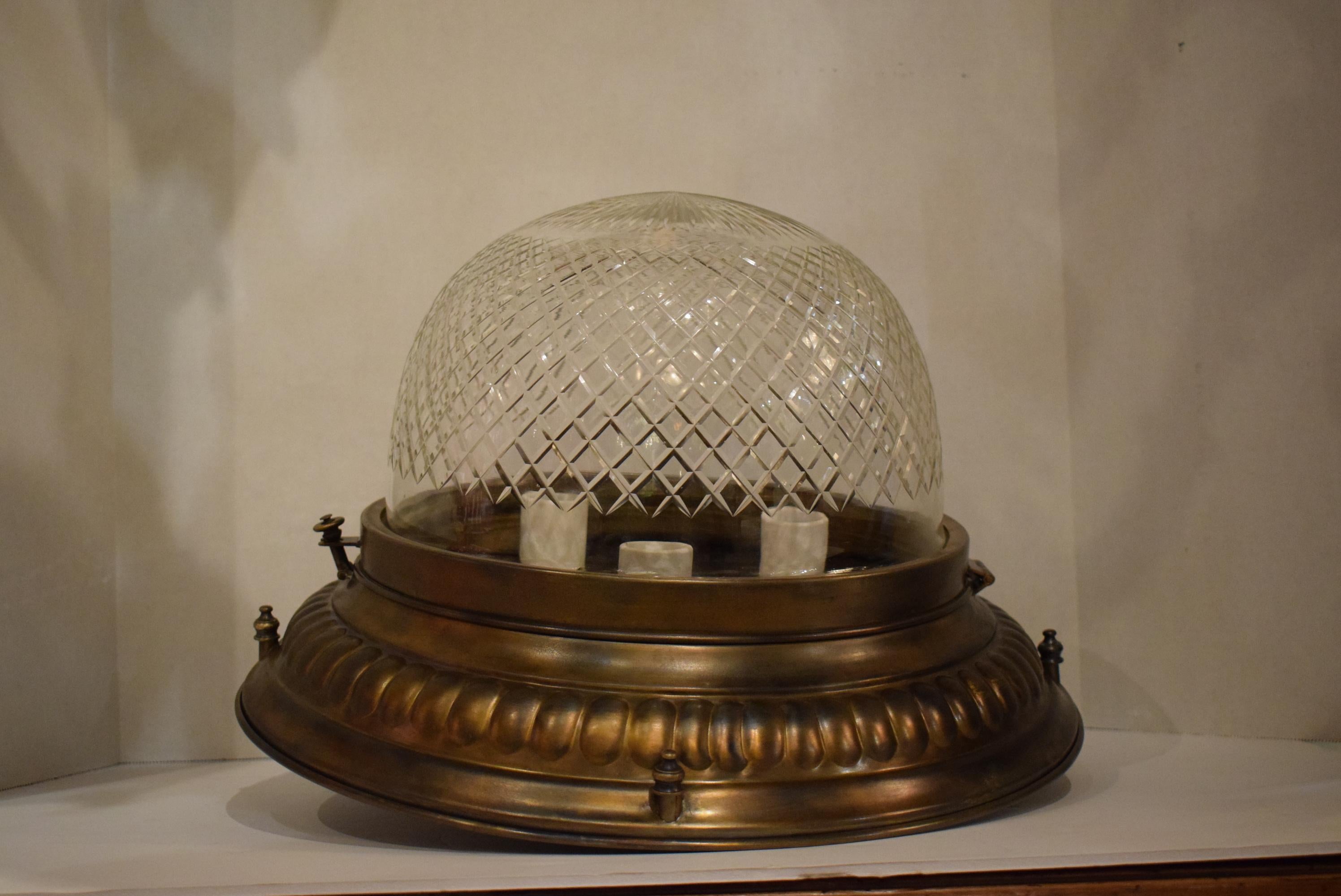A fine gilt bronze plafonnier with handcut crystal dome, France, circa 1920. Three (3) lights
Dimensions: Height 11