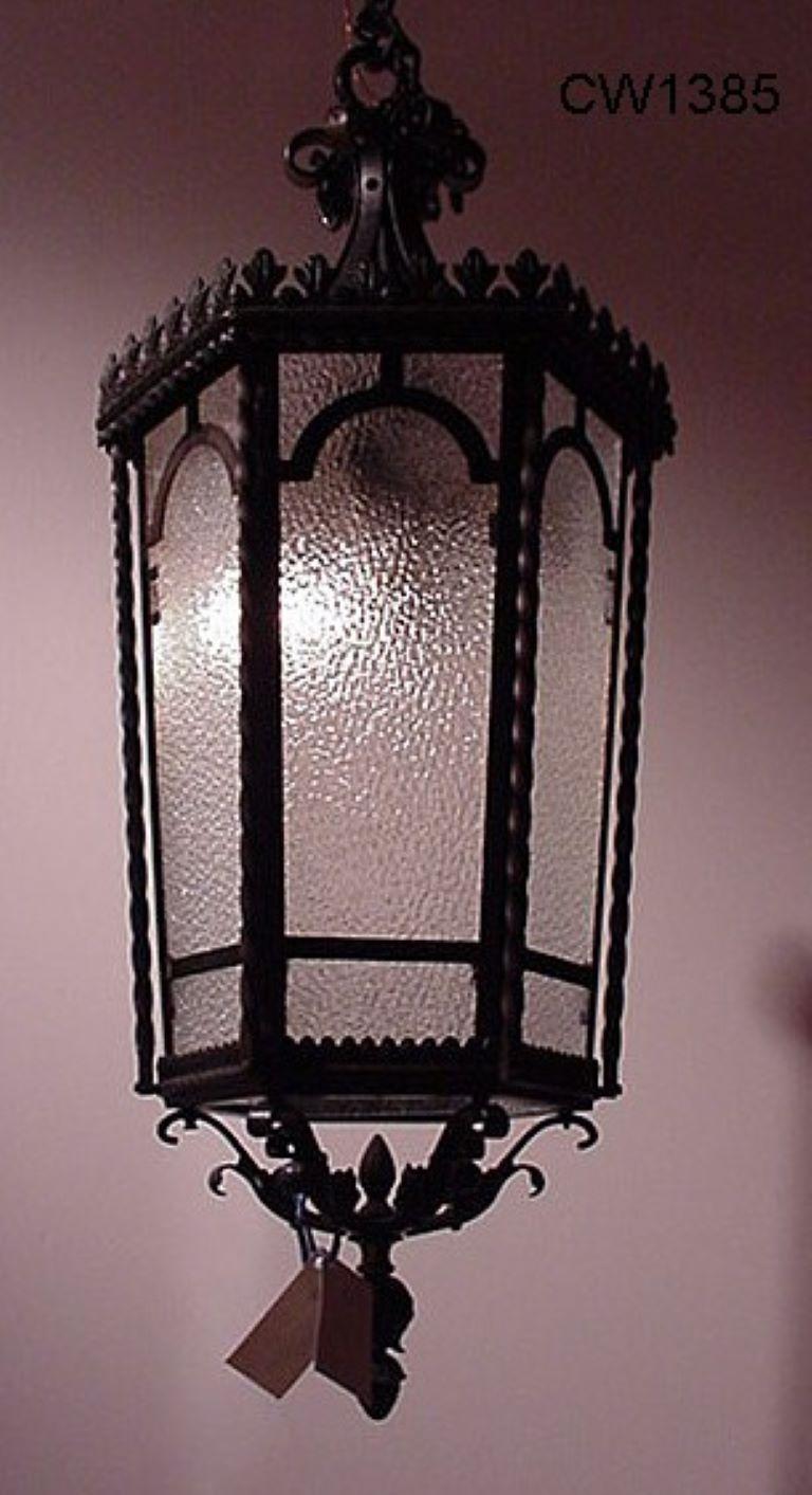 A fine hand forged iron lantern with glass panels. 8-light.
France, circa 1940.
Dimensions: Height 36