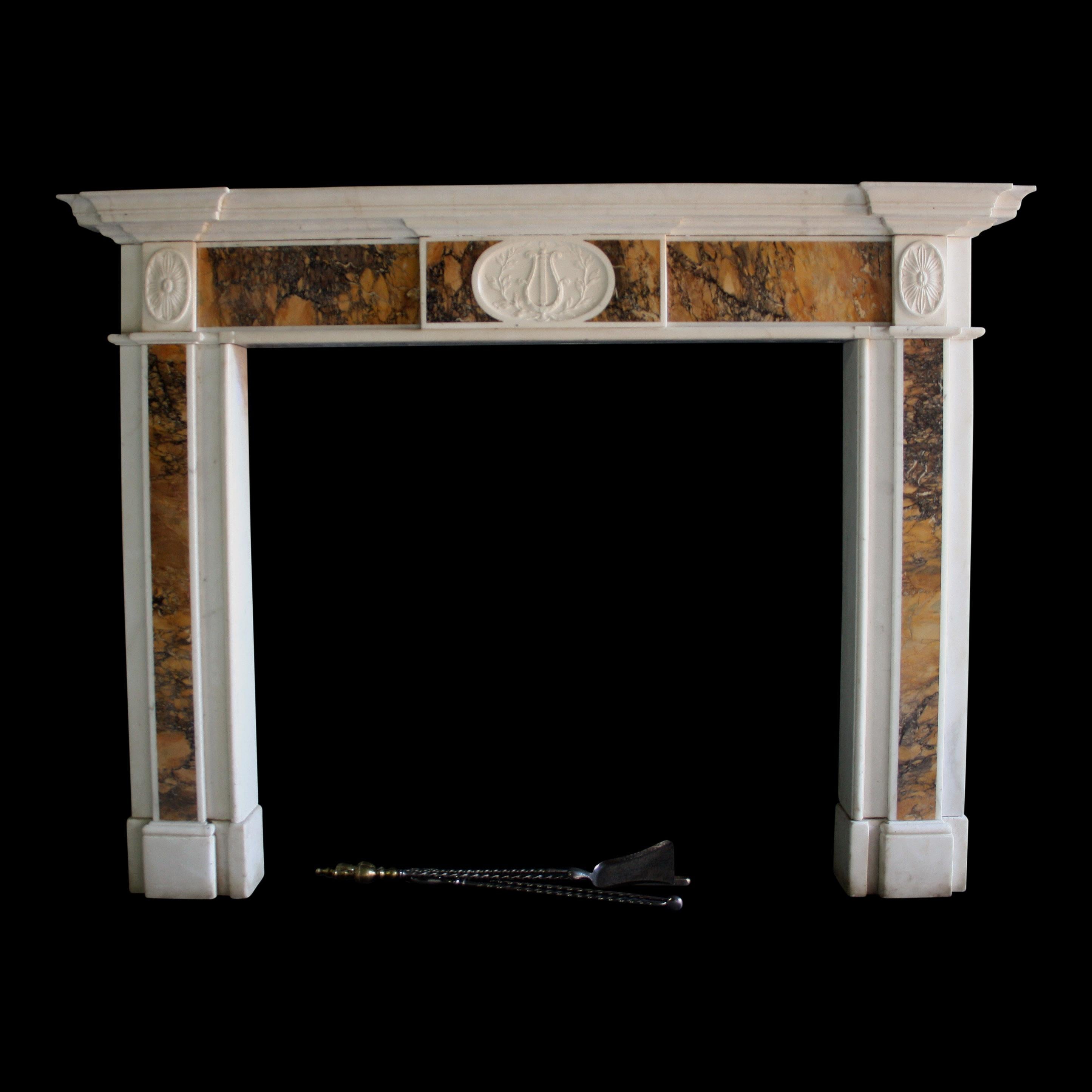 A Fine Irish Georgian Chimneypiece Circa 1770

The stepped and panelled jambs are inlaid with powerfully figured convent Siena marble standing on moulded block feet. The frieze has paterae corner blocks, convent Siena on either side of the centre