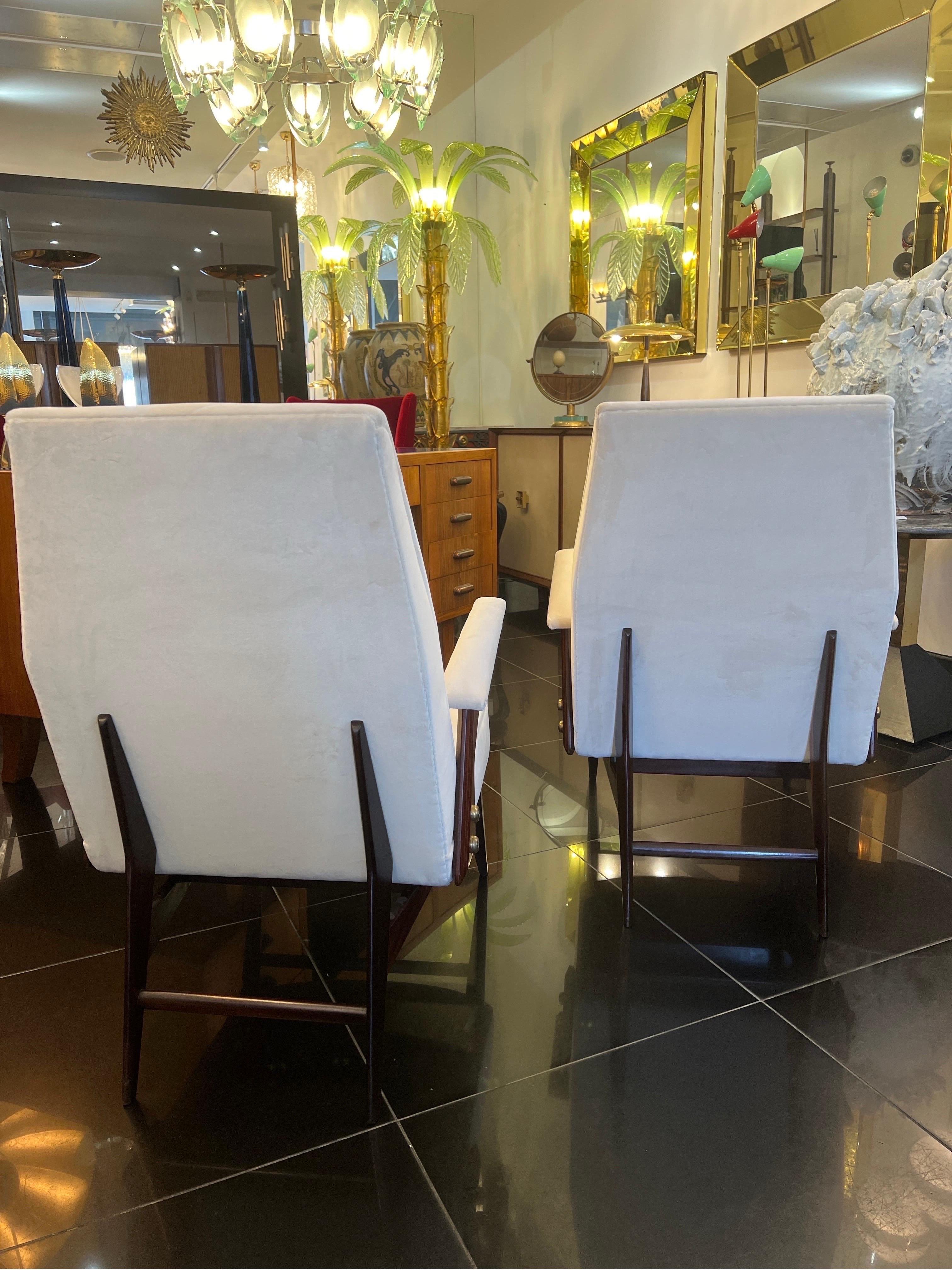Brass A Fine Italian pair of walnut framed armchairs in cream velvet  For Sale