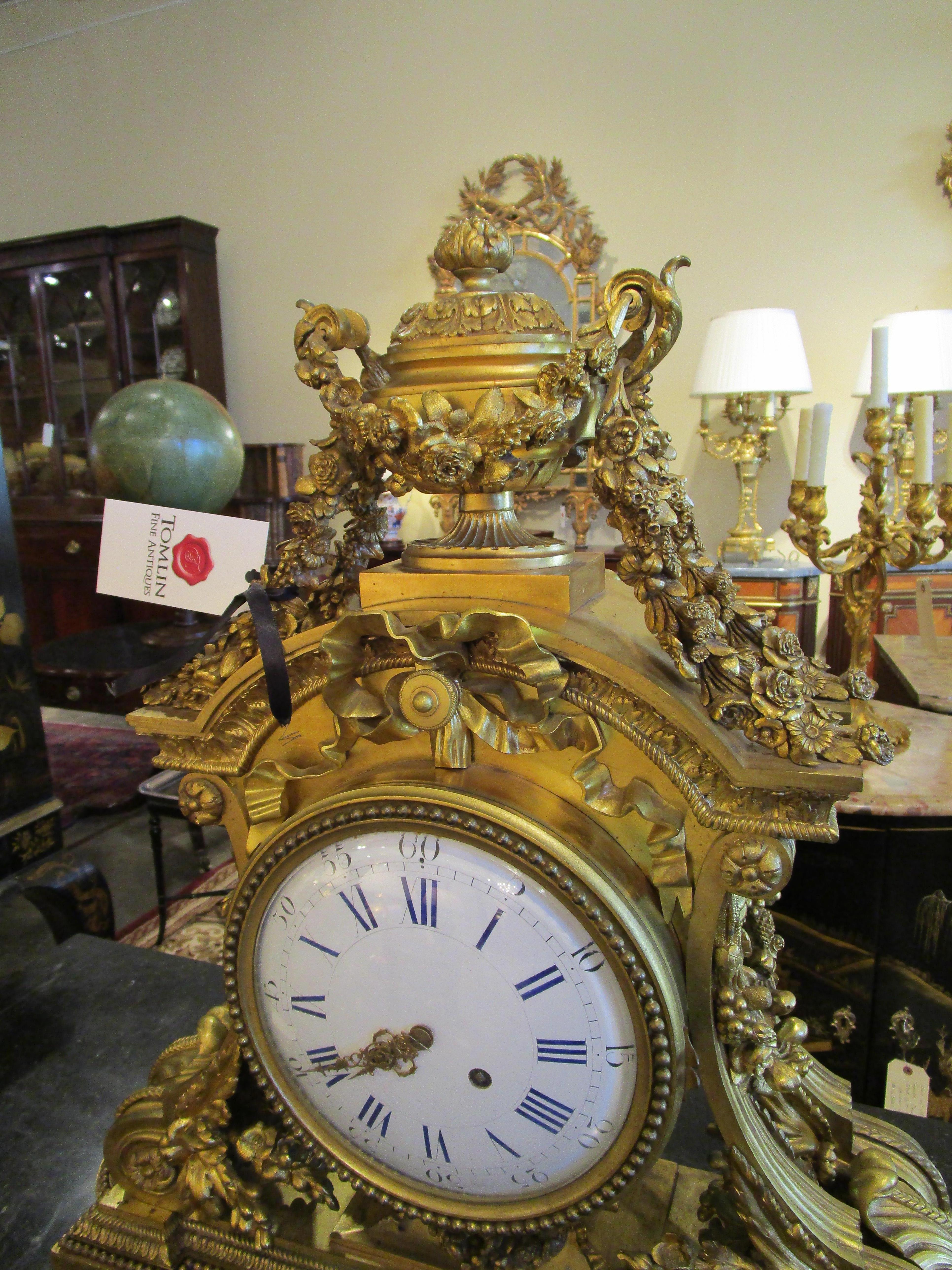 A very fine 19th century French Louis XV gilt bronze mantle clock. Beautiful condition all original and working. Signed Pitoit Paris.