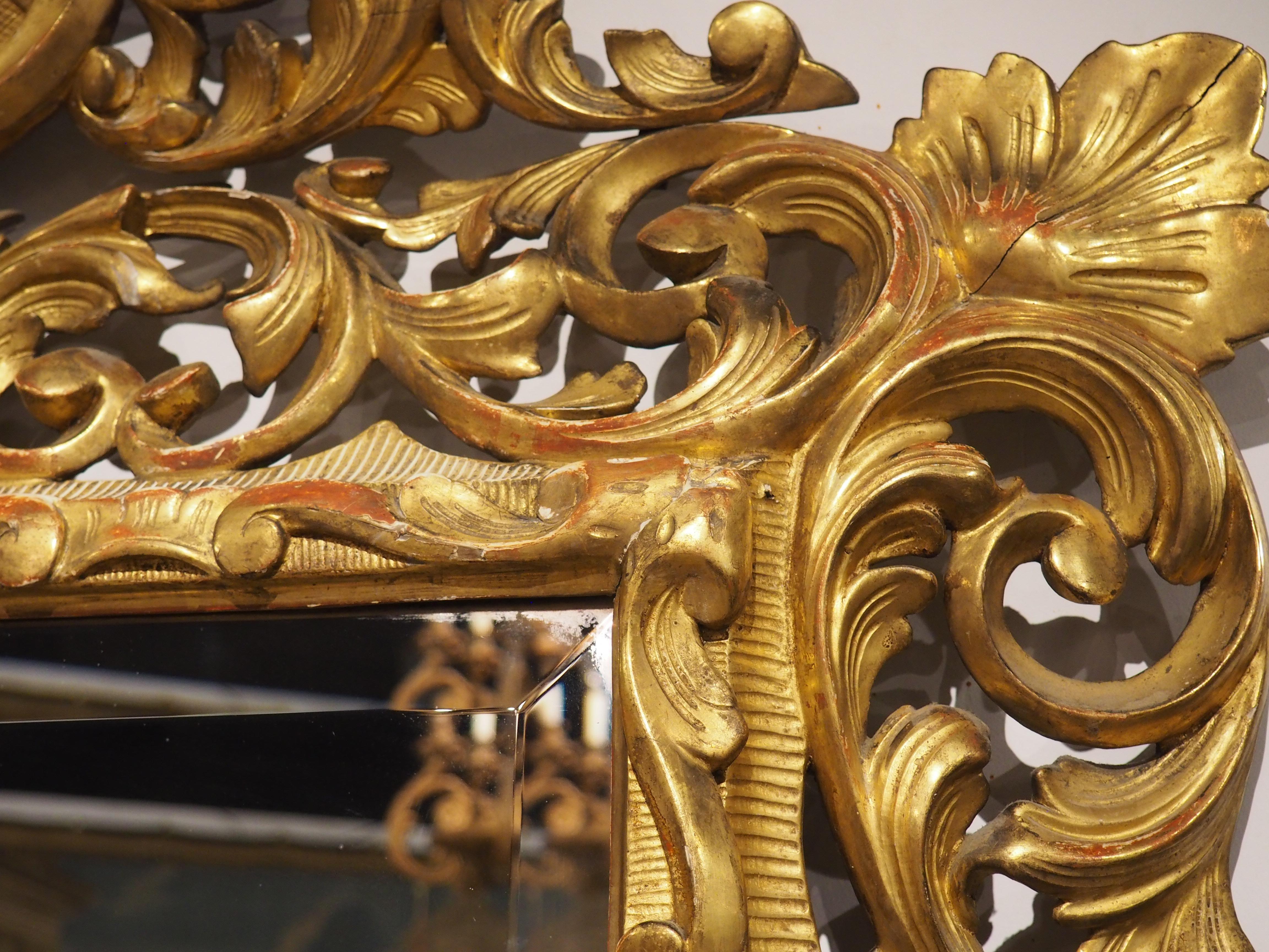 Glass A Fine Late 18th Century Italian Florentine Carved and Gilded Mirror For Sale