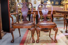 A fine late 19th c Queen Anne style burled Walnut dining table and 8 chairs