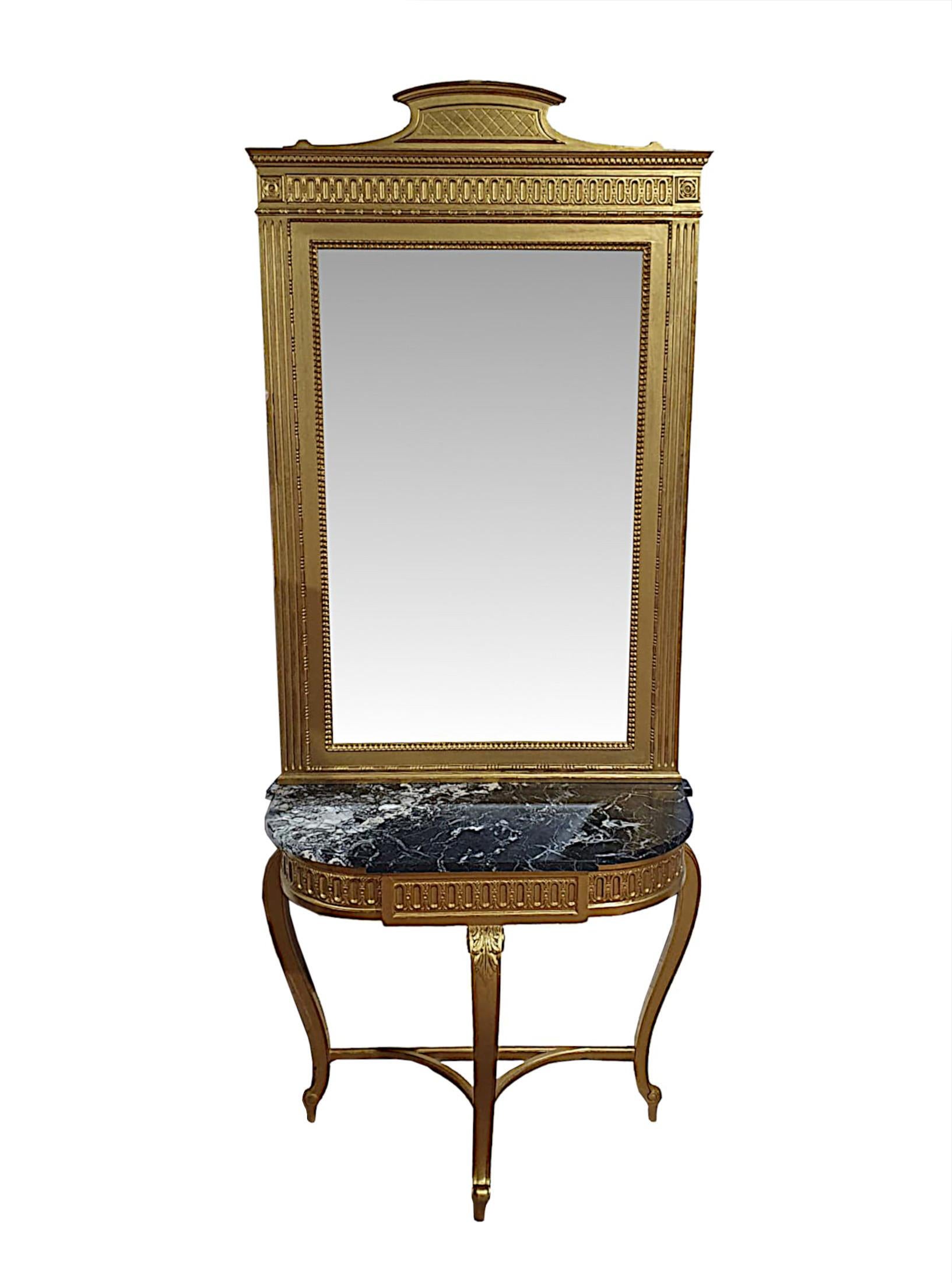 A very fine late 19th century marble top giltwood console table and matching giltwood mirror. The original bevelled mirror glass plate of rectangular form is set within a fabulously hand carved, moulded and fluted giltwood frame with beautiful