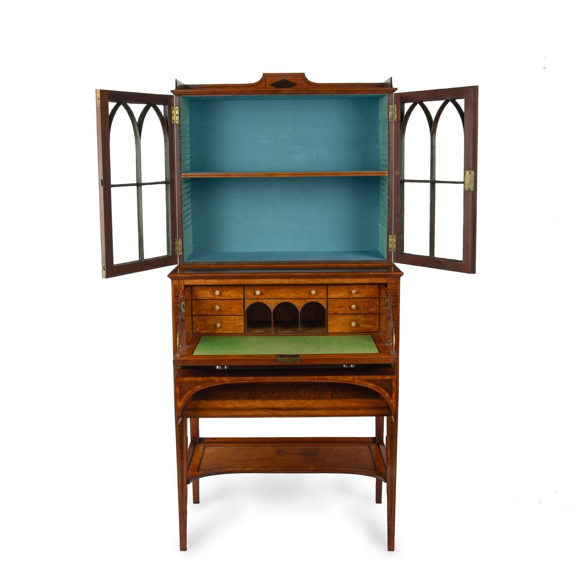 English A fine late George III satinwood and snakewood secretaire cabinet For Sale