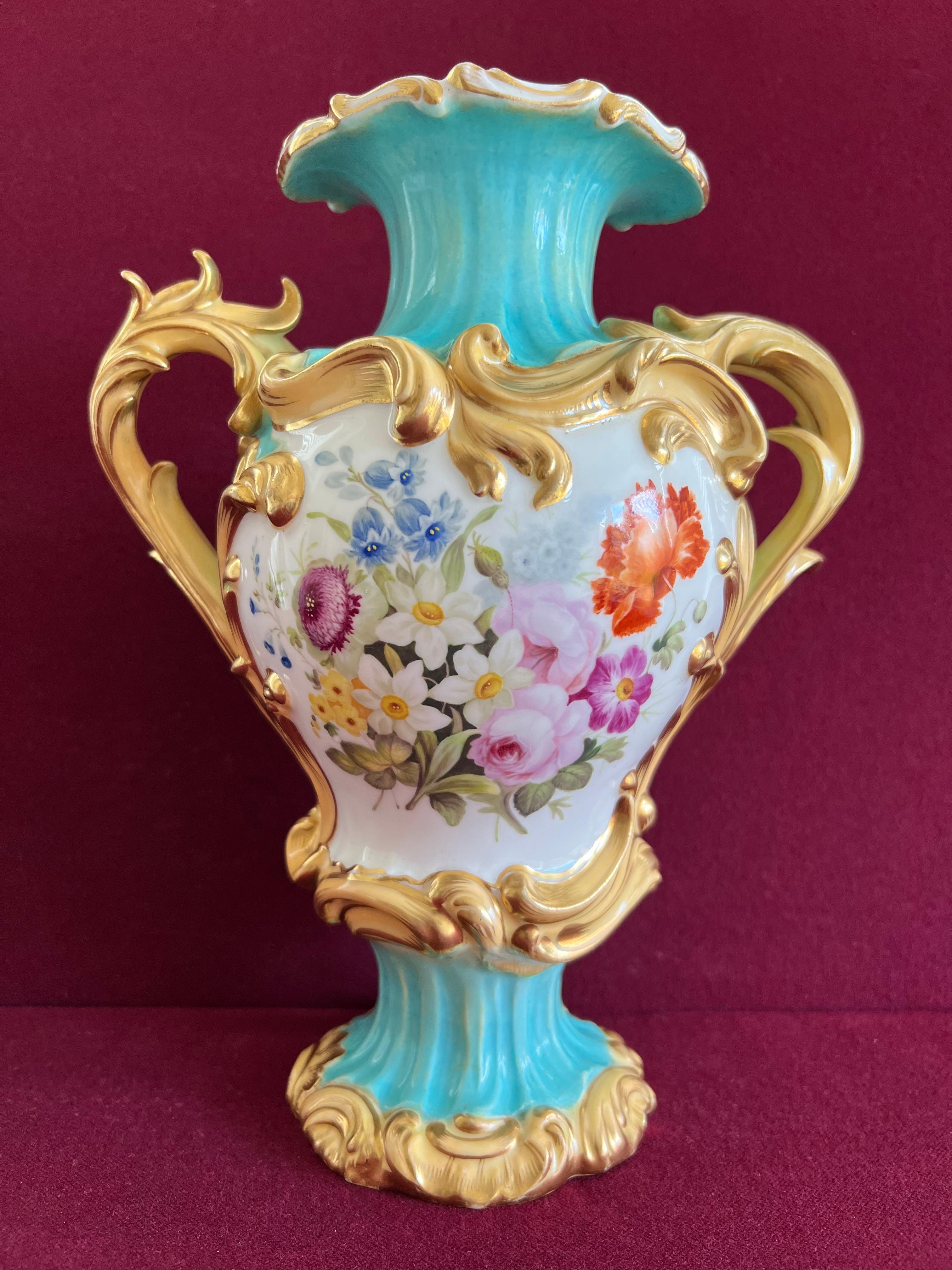 A fine Minton porcelain 'Dresden Antique Vase' c.1835-1840. Of rococo inspired form, designated as ornamental design number 74 'Dresden Antique Vase' in the Minton Factory design book. Turquoise coloured ground with moulded scrolling panels and