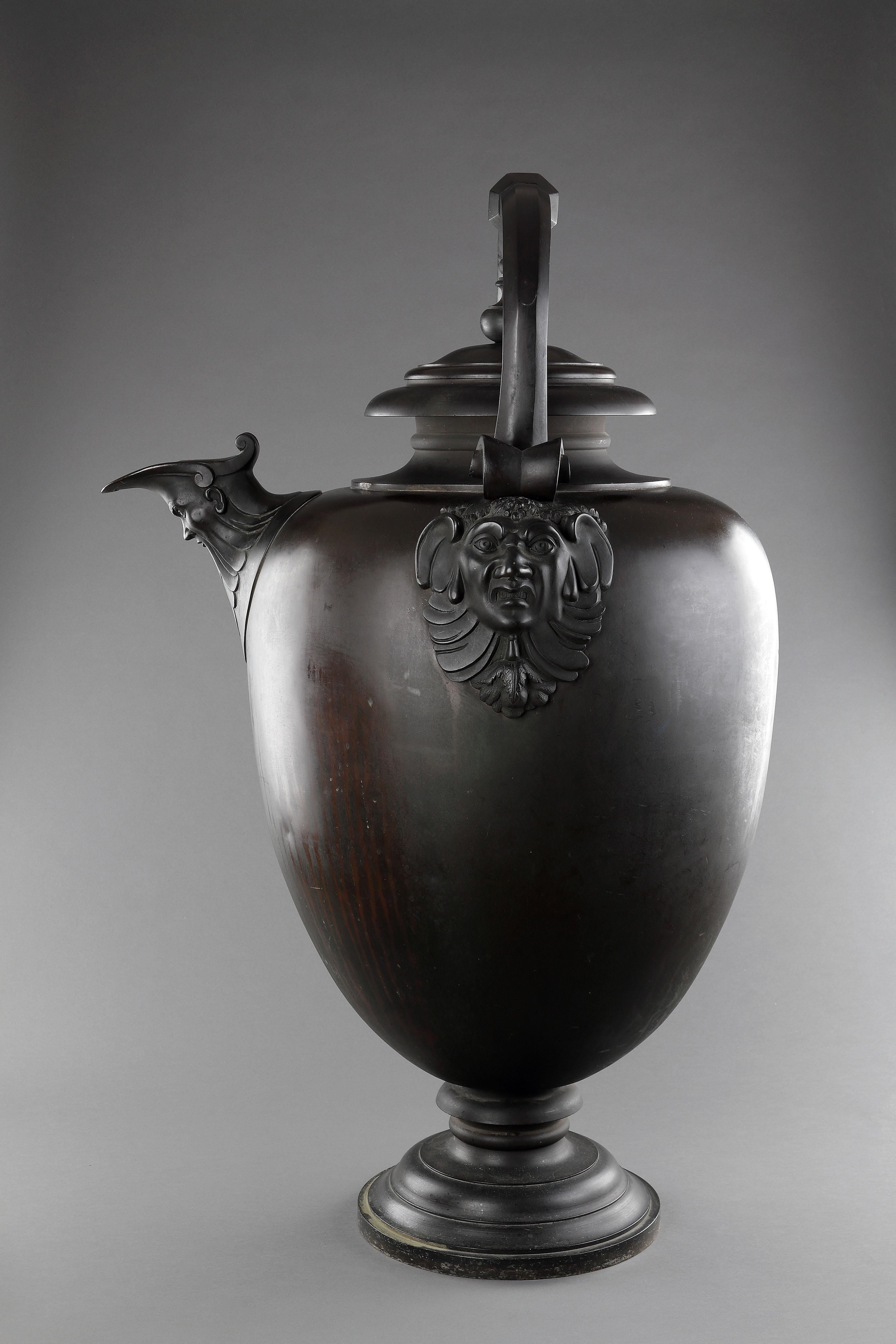 A Very Fine and Monumental Ovoid Vase or Ewer ‘after the antique’ 
Bronze 
The bulbous body with a spout springing from a grotesque mask, the loop handle cast and chased with fruit arising from caryatids, with a moevable circular lid
French or