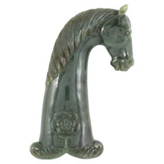 Fina daga de jade mogol con empuñadura tallada en forma de cabeza de caballo  Arte islámico