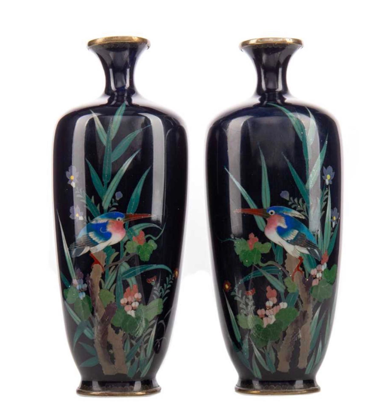 A Fine Opposing Pair of Japanese Cloisonne Enamel Vases. 19th Century.

OPPOSING PAIR OF JAPANESE CLOISONNE ENAMEL VASES, Meiji Period (1868-1912), worked in silver wire and decorated with a kingfisher perched amongst flowers and leaves, against a