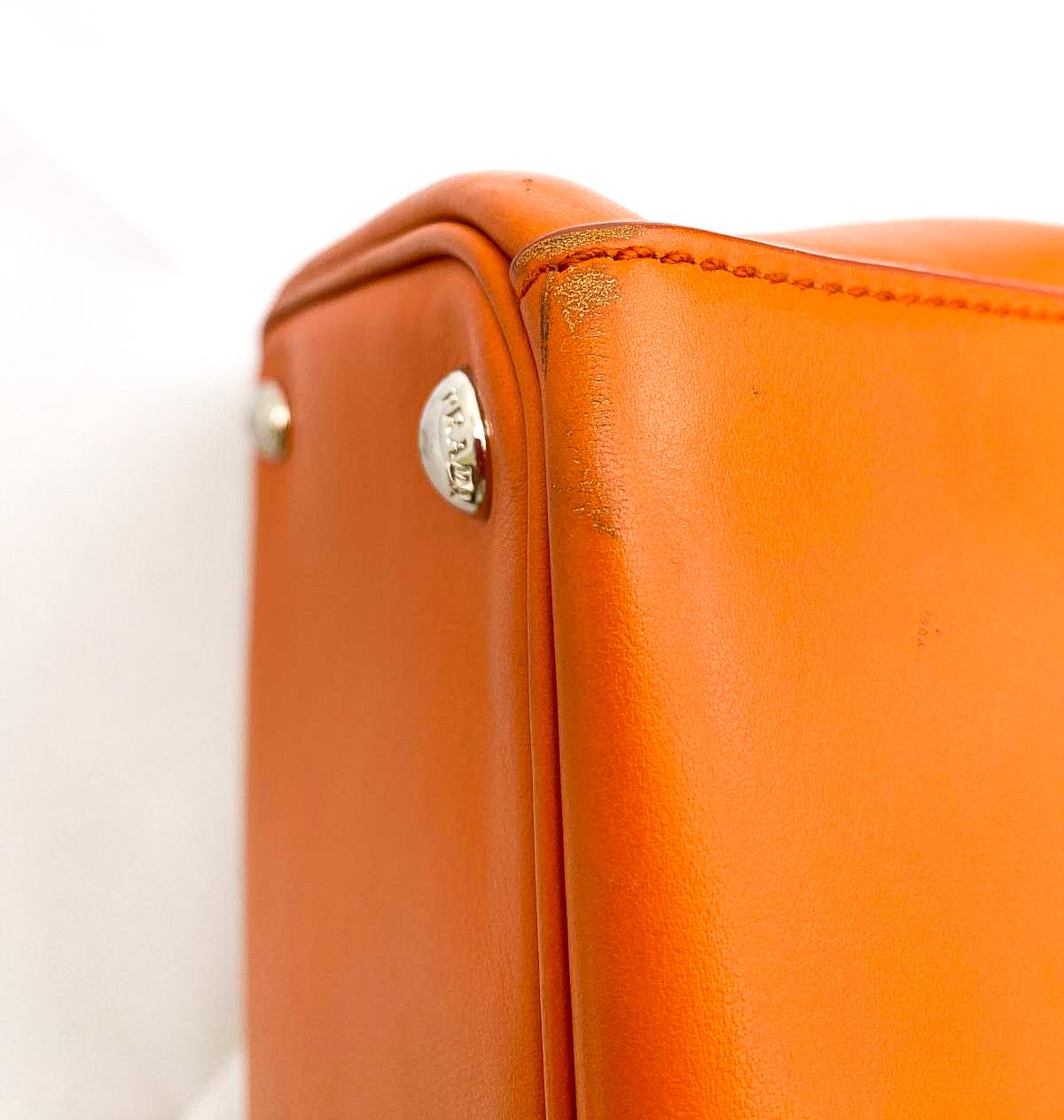 A fine orange leather 'Galleria' handbag, Prada, Italy, 2016 10