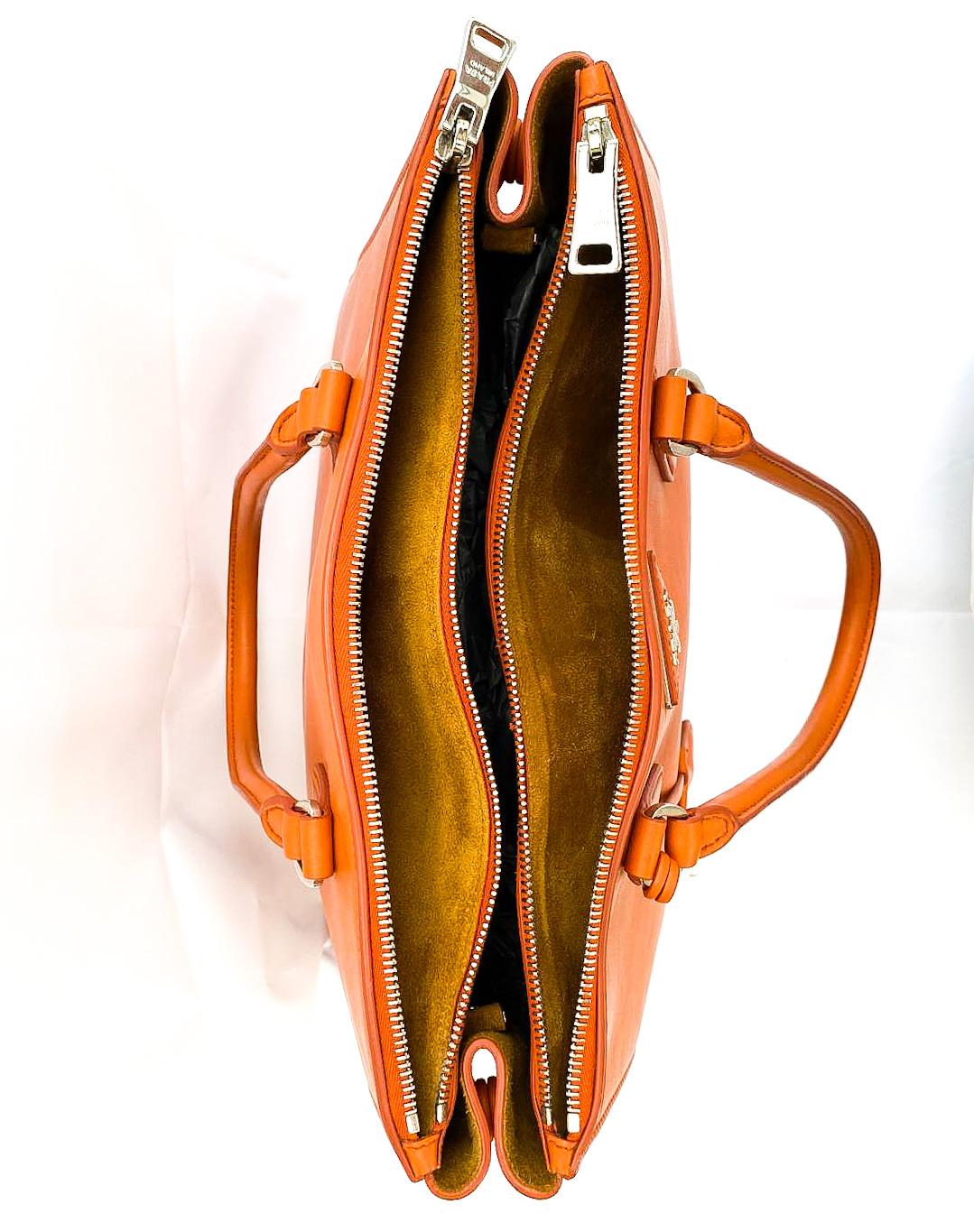 A fine orange leather 'Galleria' handbag, Prada, Italy, 2016 11
