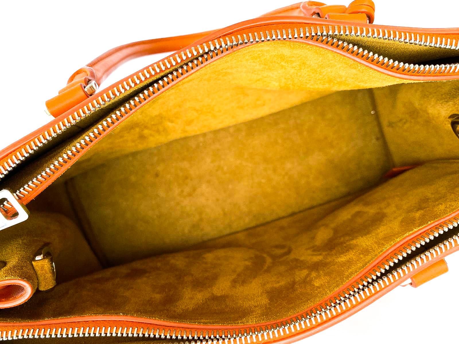 A fine orange leather 'Galleria' handbag, Prada, Italy, 2016 12