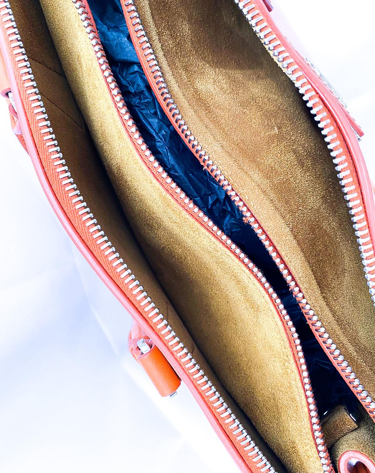 A fine orange leather 'Galleria' handbag, Prada, Italy, 2016 13