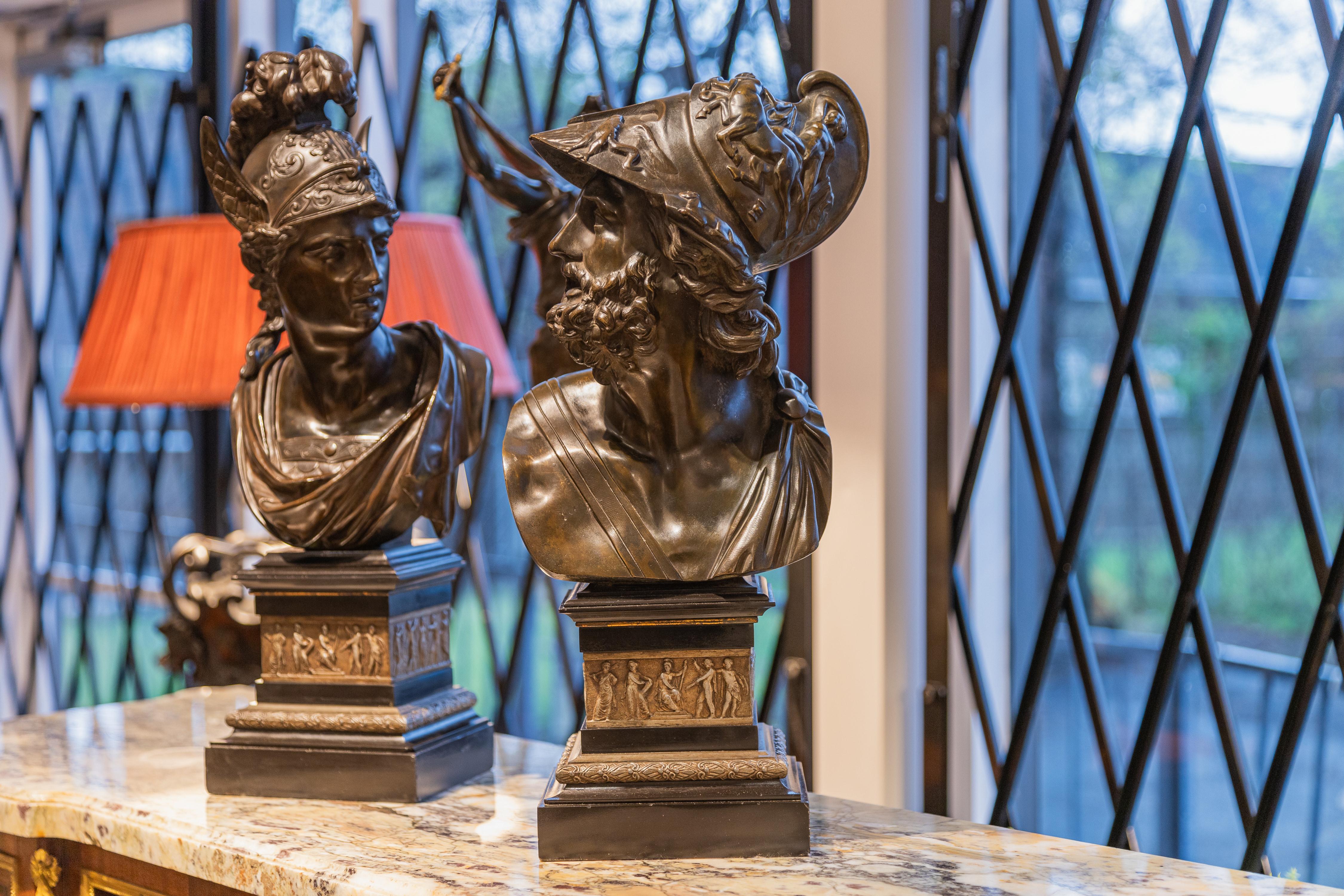 A fine and rare pair of 19th century Classical Roman bronze heads of Ajax and Minerva. Done by famed American company  Henry Bonnard Bronze Co . This company was started by two French men in the United States in the late 19th century in New York .