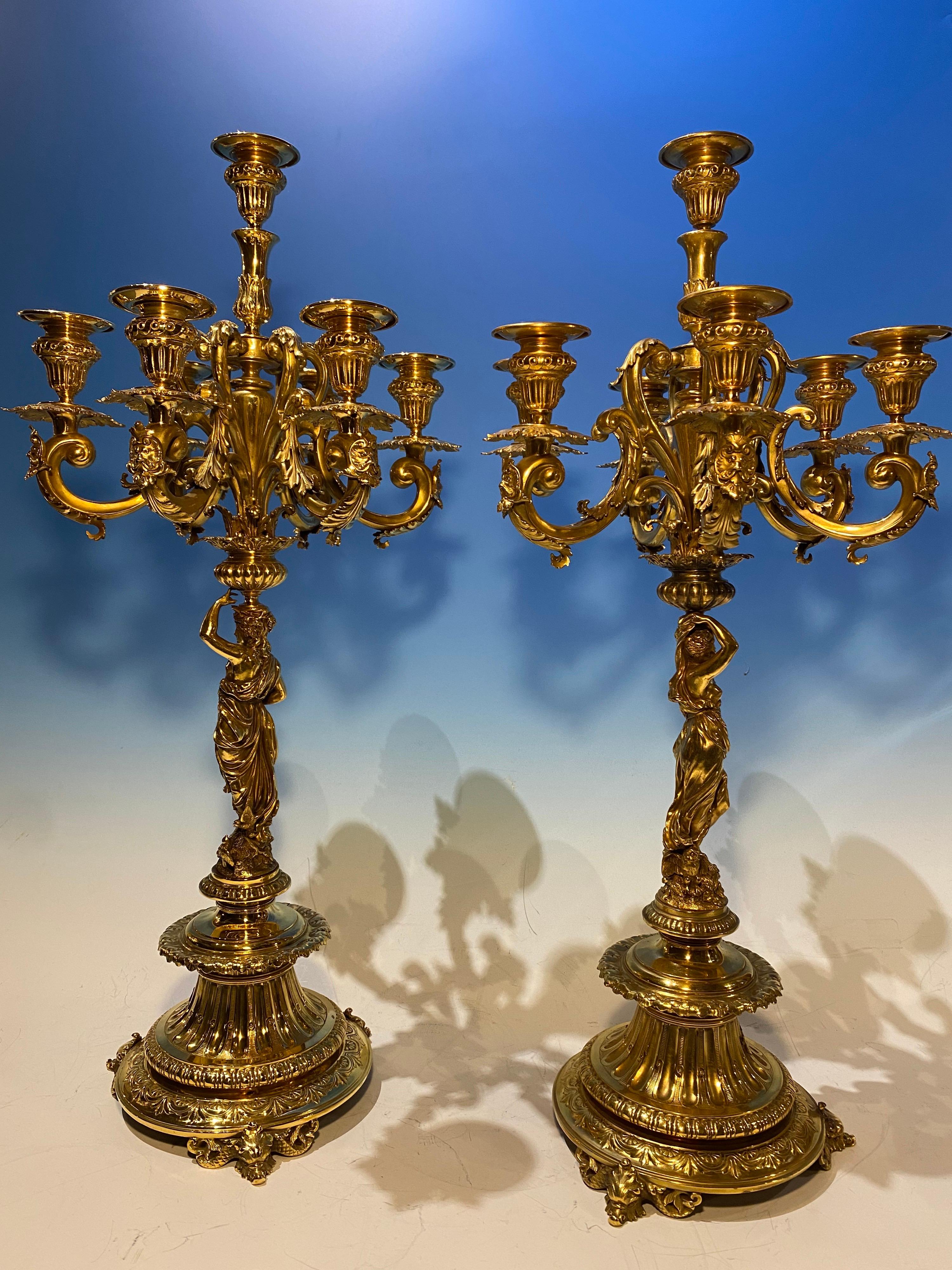 An exceptional pair of Austrian neoclassical style silver gilt six light figural candelabra A.D. Hauptmann & Co., Vienna late 19th/early 20th century. Each candelabra having a figural fully robed women with a dove and/or an owl by their feet. The