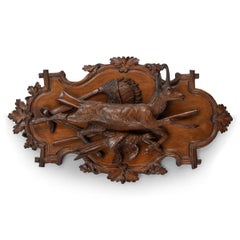 A fine pair of 19th century Black Forest Walnut game plaques attributed to Johan