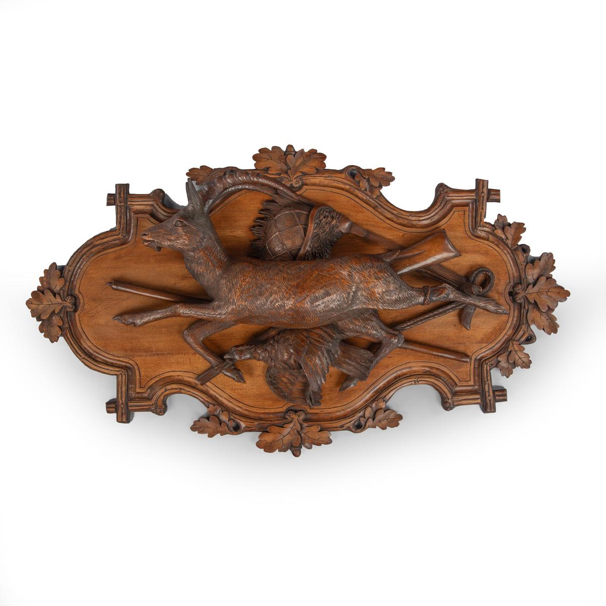 Swiss A fine pair of 19th century Black Forest Walnut game plaques attributed to Johan For Sale