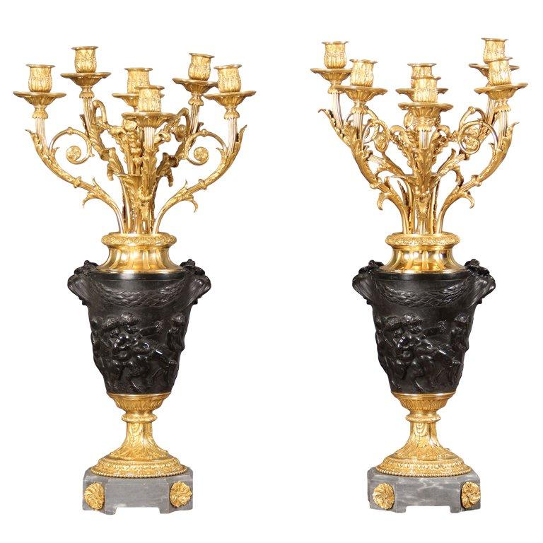 A Fine Pair of 19th Century Candelabra After Claude-Michel Clodion
