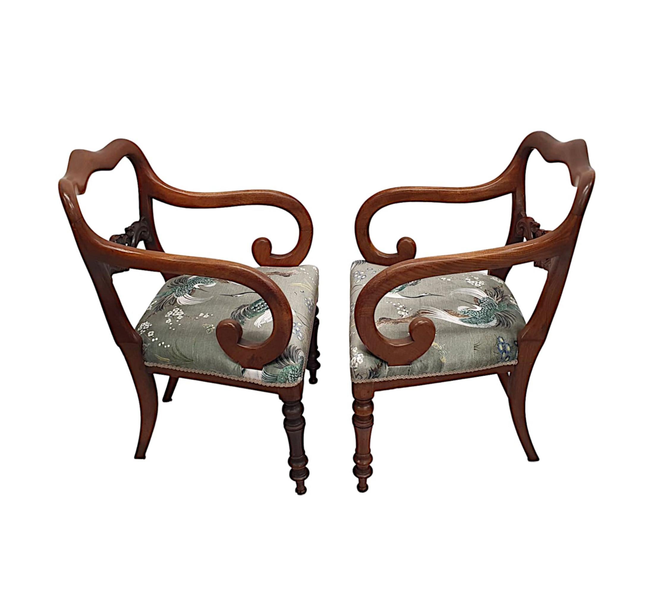 A fine pair of 19th Century mahogany carver armchairs of fabulous quality, stunningly hand carved with rich patination and grain.  The serpentine crest rail is raised above pierced and shaped back splat with centred acanthus leaf and s-scroll motif